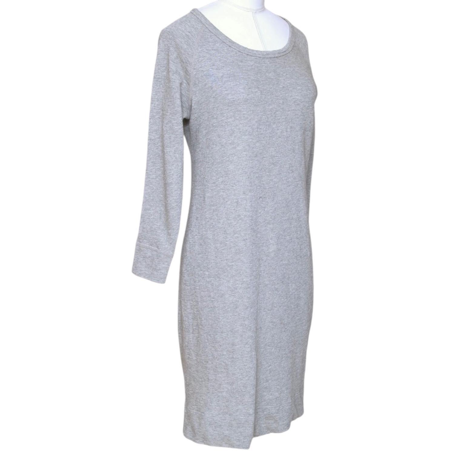 GUARANTEED AUTHENTIC JAMES PERSE GREY T SHIRT DRESS

Design:
  - Comfortable to wear slip on grey sweatshirt dress.
  - Scoop neck.
  - 3/4 sleeve.
  - Beautiful, lightweight year round.

Size: 1

Material: 100% Cotton

Measurements (Approximate