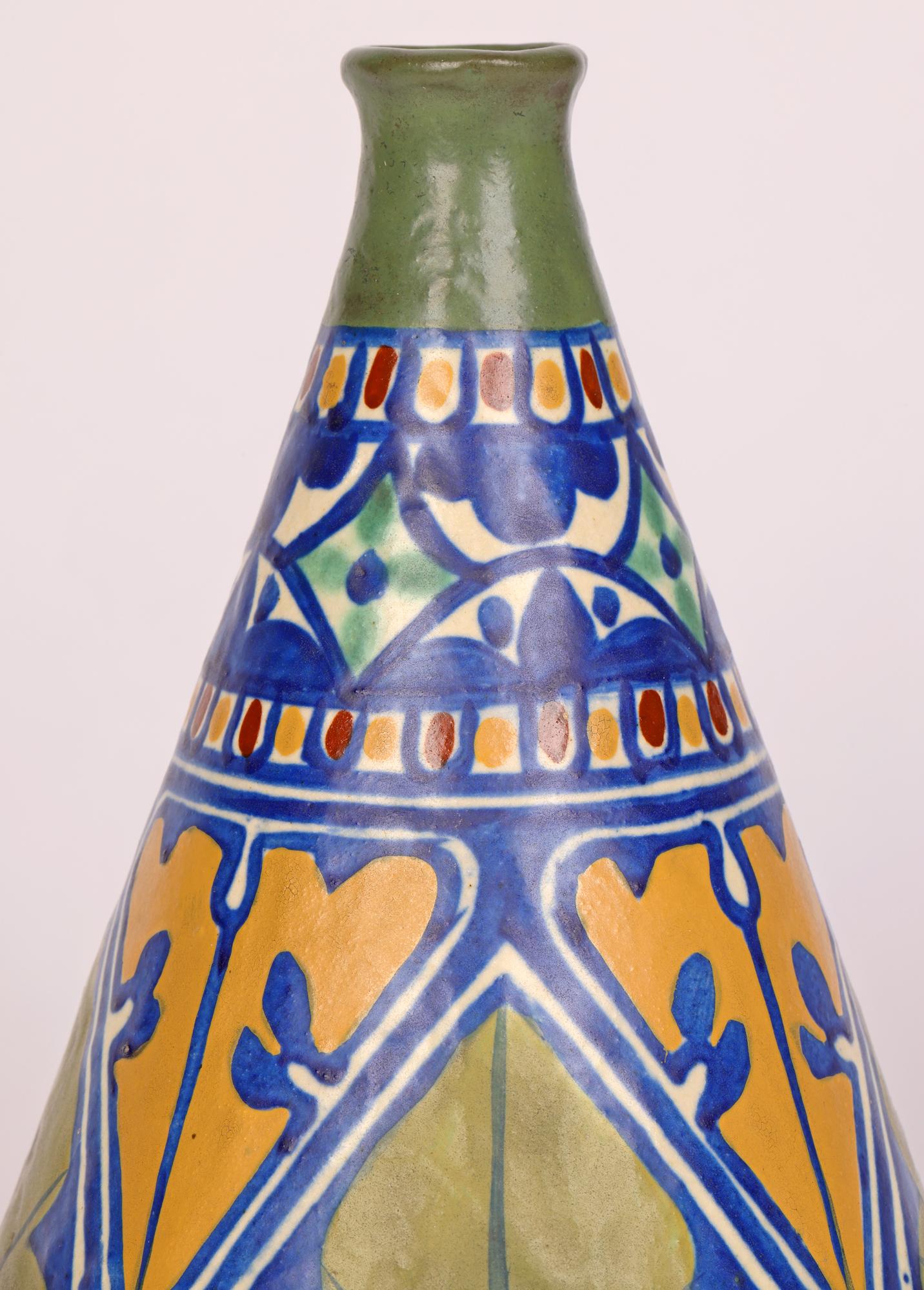 A very stylish early Art Deco art pottery vase decorated with stylized patterning by James Plant of Hanley and dating from around 1915. The pottery produced a range of vases of varying shape using this pattern which we believe was probably inspired