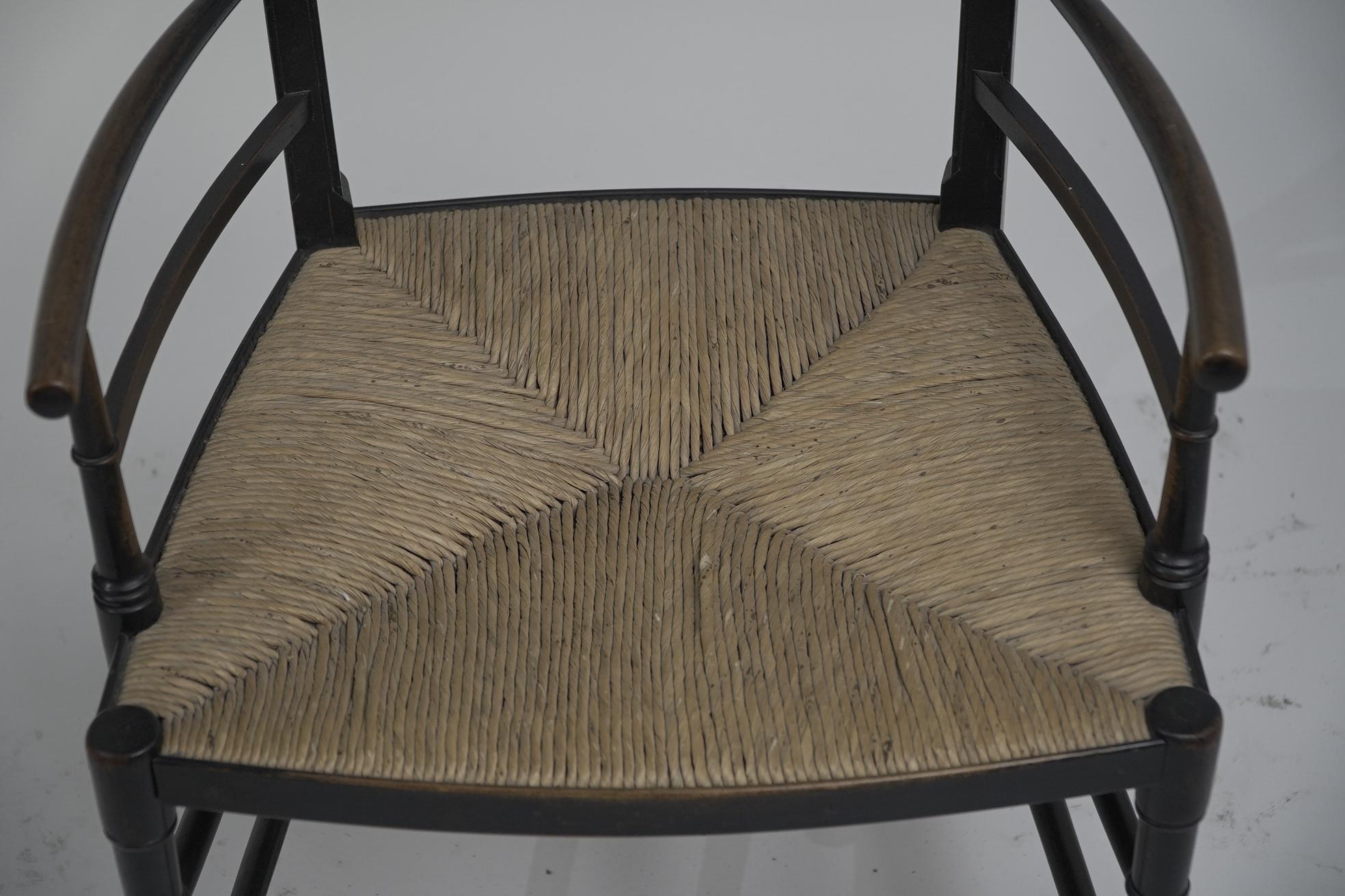 James Plucknett attri. ein anglo-japanischer ebonisierter Sessel mit abgenutzter hoher Rückenlehne (Buchenholz) im Angebot