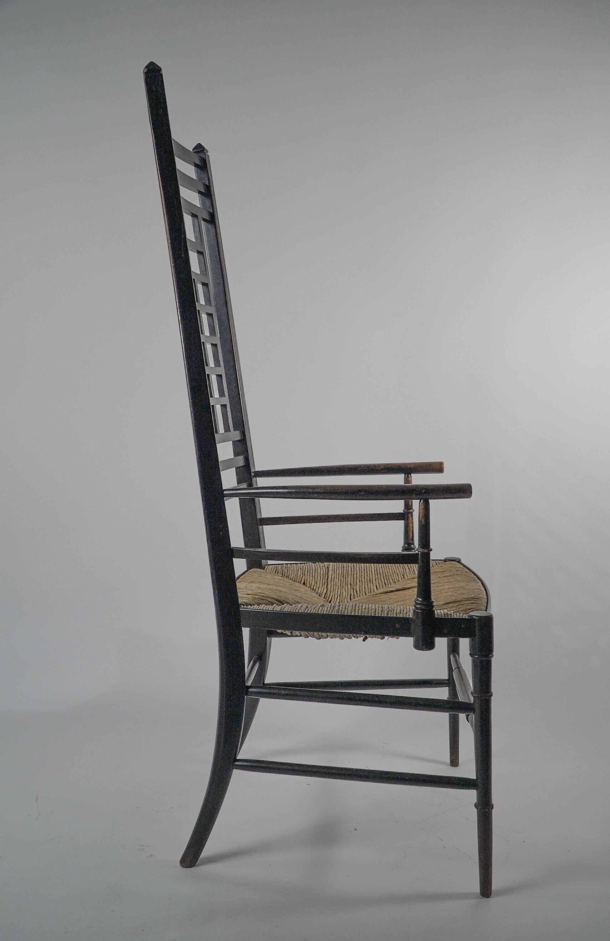 James Plucknett attri. an exagerated high back AngloJapanese ebonized armchair In Good Condition For Sale In London, GB