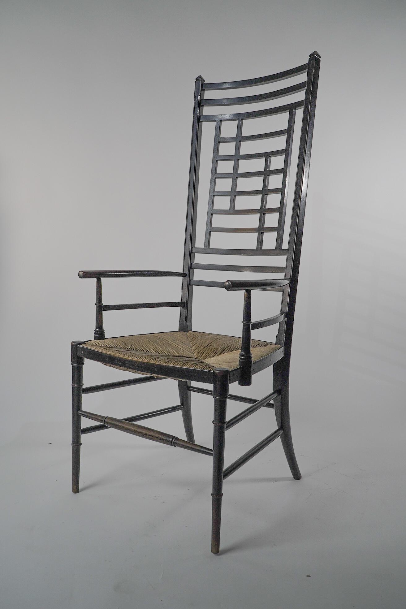 Ebonized James Plucknett attri. an exagerated high back AngloJapanese ebonized armchair For Sale