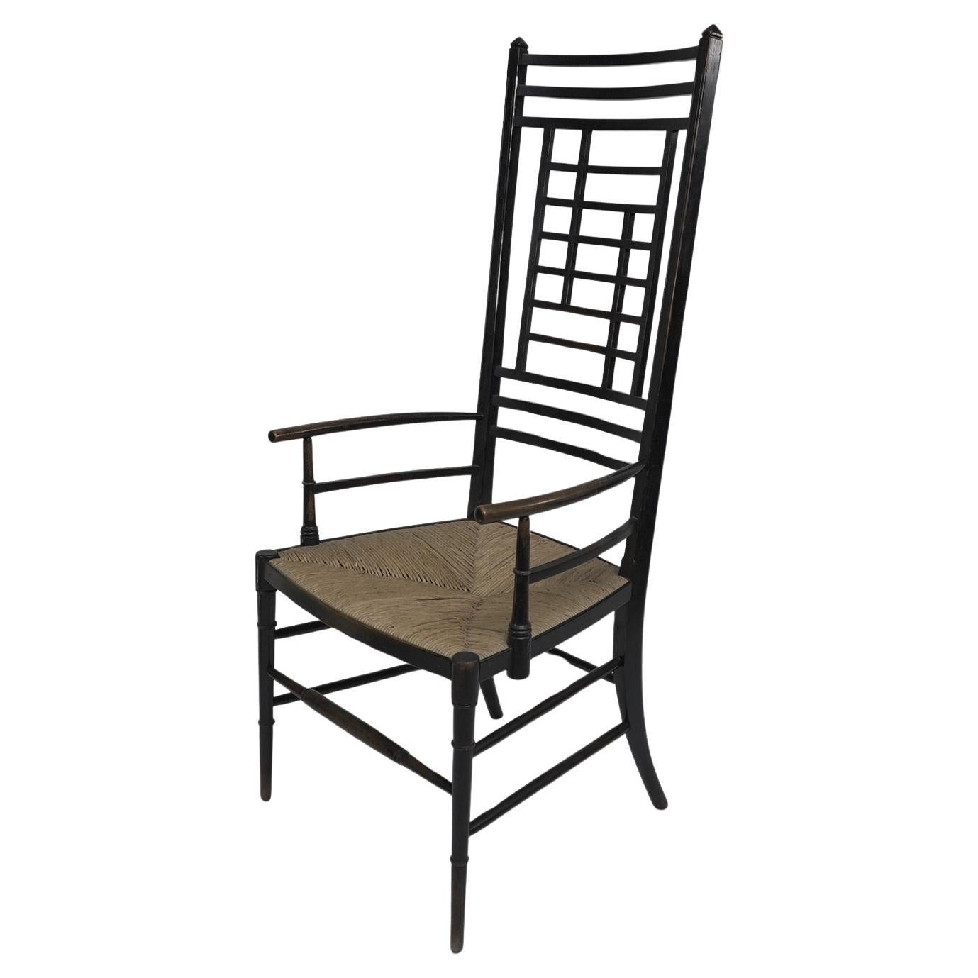 James Plucknett attri. un exagerado sillón anglojaponés ebonizado de respaldo alto