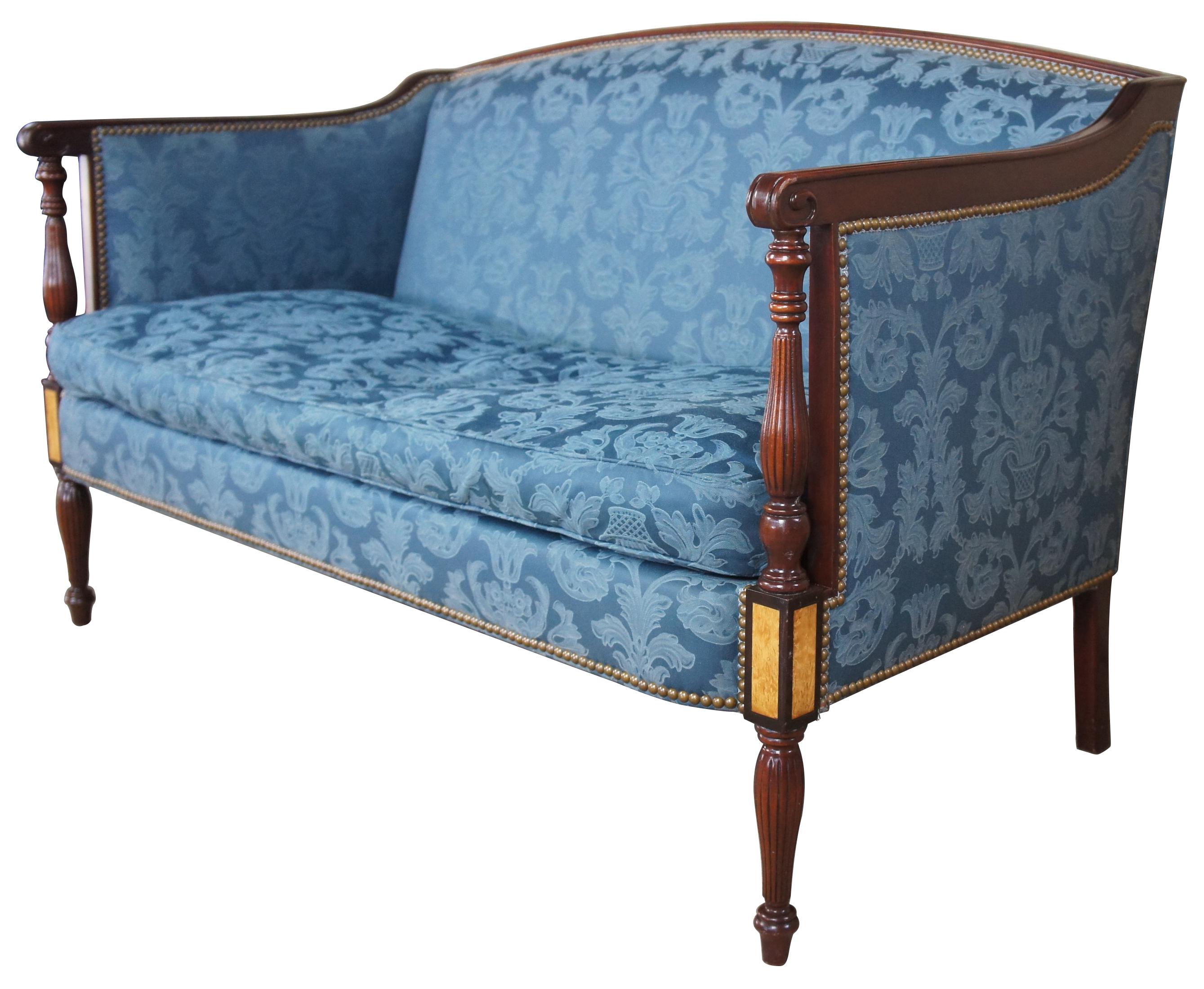 James River plantation Sheraton mahogany settee loveseat by Hickory Chair Co

Blue Sheraton loveseat. Historical James River Plantation collection item # 1844-00 by Hickory Chair Company. The graceful, slender, reeded and tapered legs make this