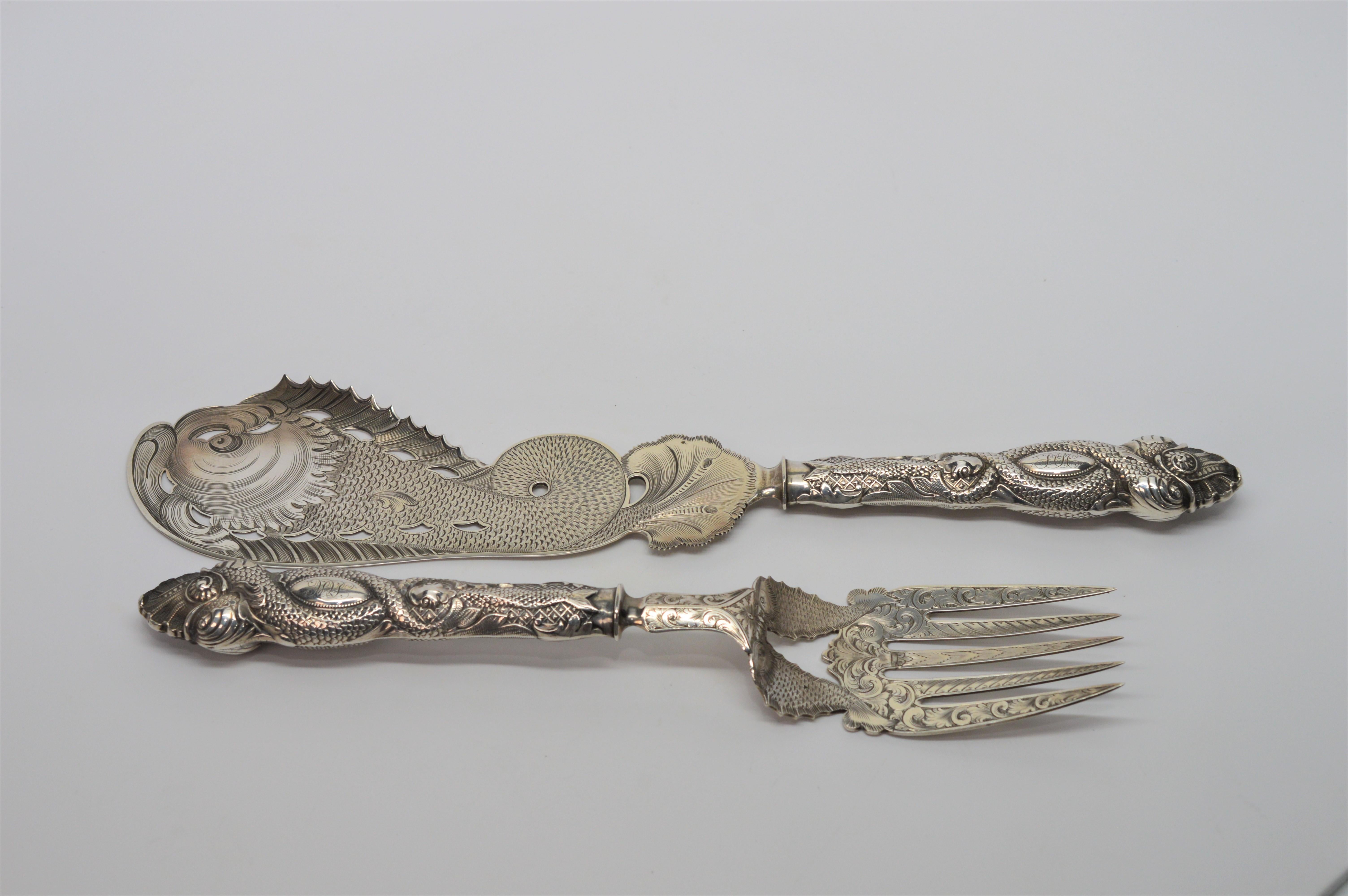 Circa 1853, by maker James S. Vancourt & Co., New York City, this ornately engraved .900 Silver Fish Knife and Fork is hallmarked and personalized.
In excellent condition.   