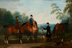 Eine elegante Dame und Gentleman Hare Couring in einer umfangreichen Landschaft