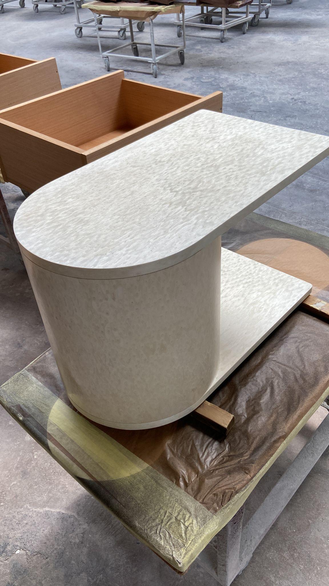 Side table in white Louro faya veneer.

As with all our furniture, this table is made to order and is therefore highly customisable, including in size and finish. The customisation fee is only 10%, which is added to the retail price.
