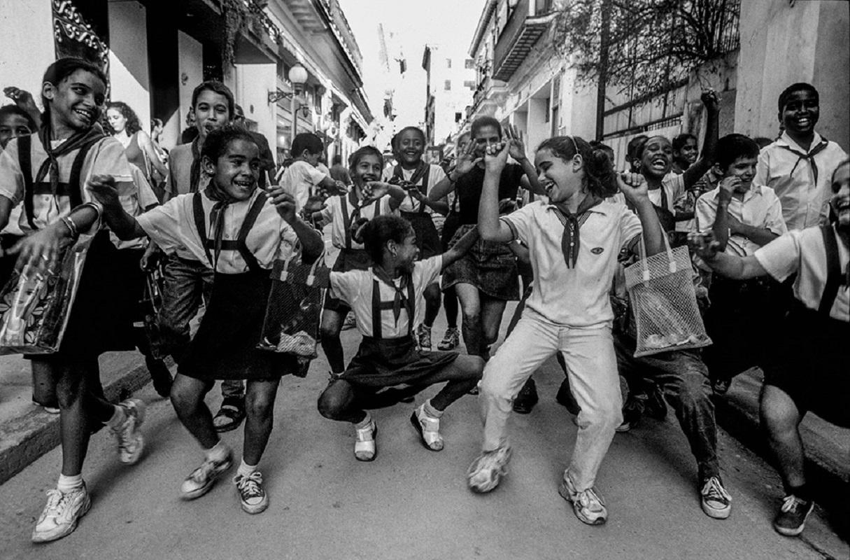 Music in Havana is an almost ever present backdrop to life… wandering the streets it is almost as though there is a soundtrack playing to the movie of your life. These school kids were between classes walking with their teacher along a street in old