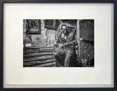 Bluesman on Beale by James Sparshatt.  Platinum print of a blues guitarist