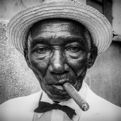 El Dandy - James Sparshatt - BW portrait photograph of cigar smoking Cuban man