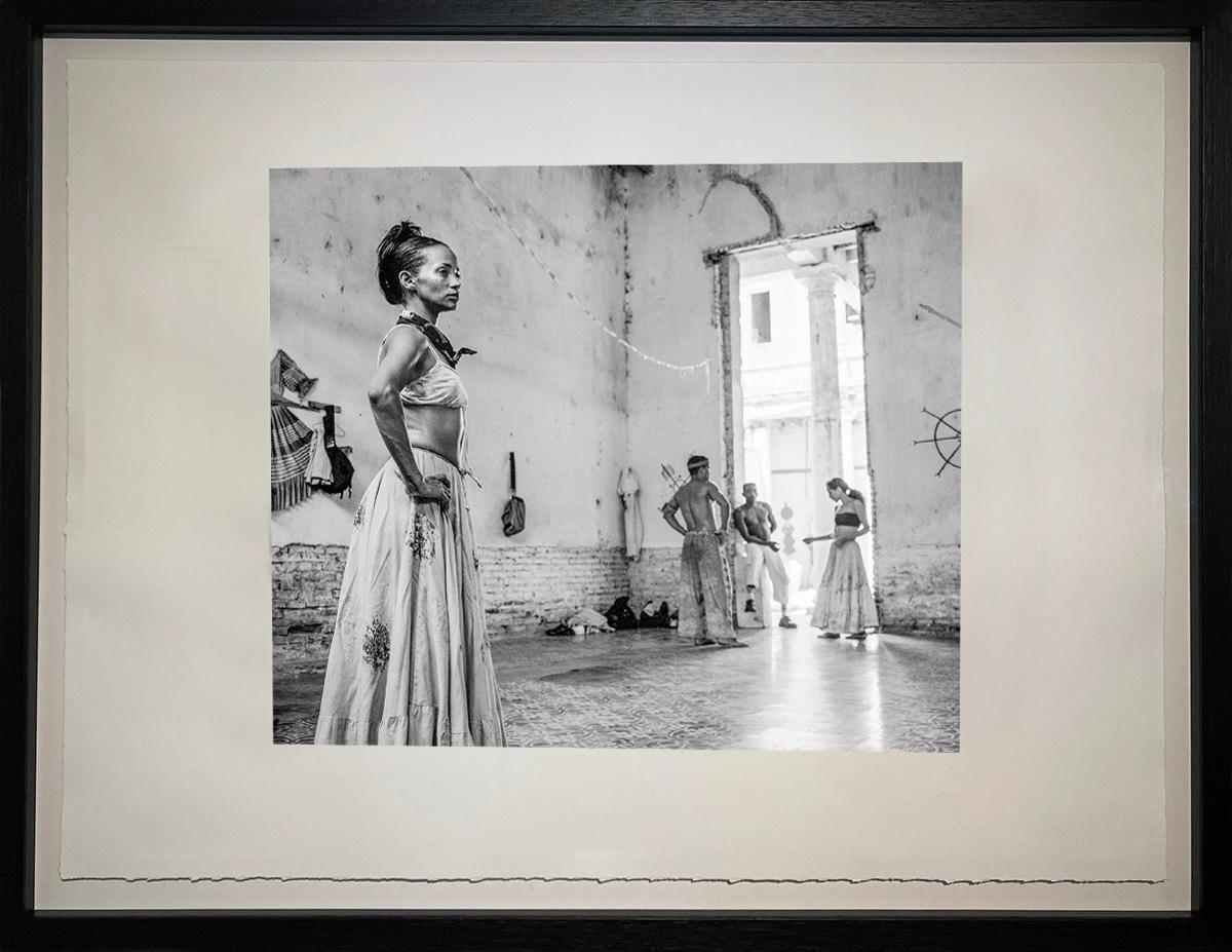 El Ensayo (the rehearsal) was taken during the Romerias de Mayo festival in Holguin Cuba. The troupe were preparing for a performance of Afro-Cuban dance and were using an abandoned colonial era building as a studio. I sat with the band most of the