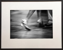 El Paso by James Sparshatt. B&W photo of the step of Argentine tango dancer