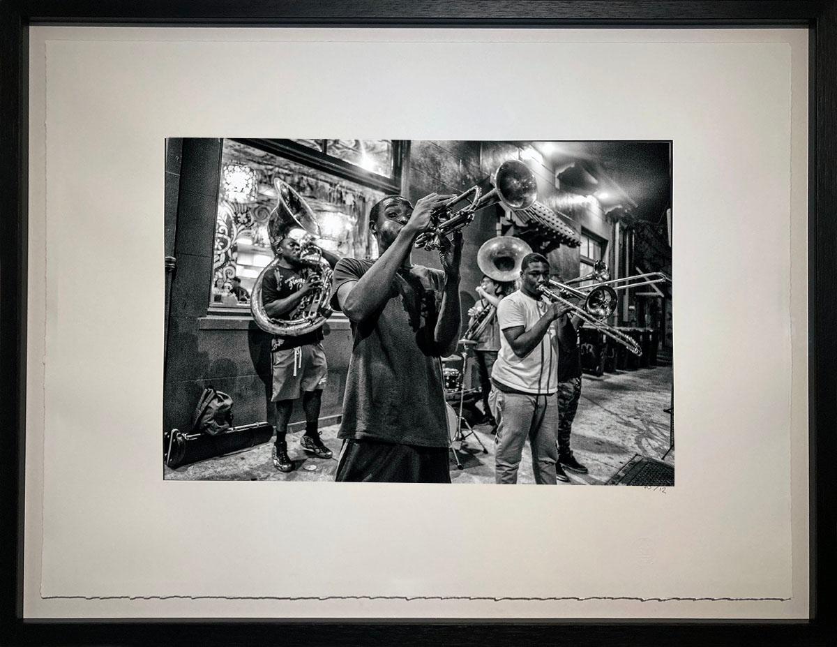 New Orleans is a mecca for music lovers from around the world. Wandering up Frenchmen Street on a sultry Louisianan evening is to be surrounded by competing sounds vying for attention. The Young Fellaz brass band station themselves on a street