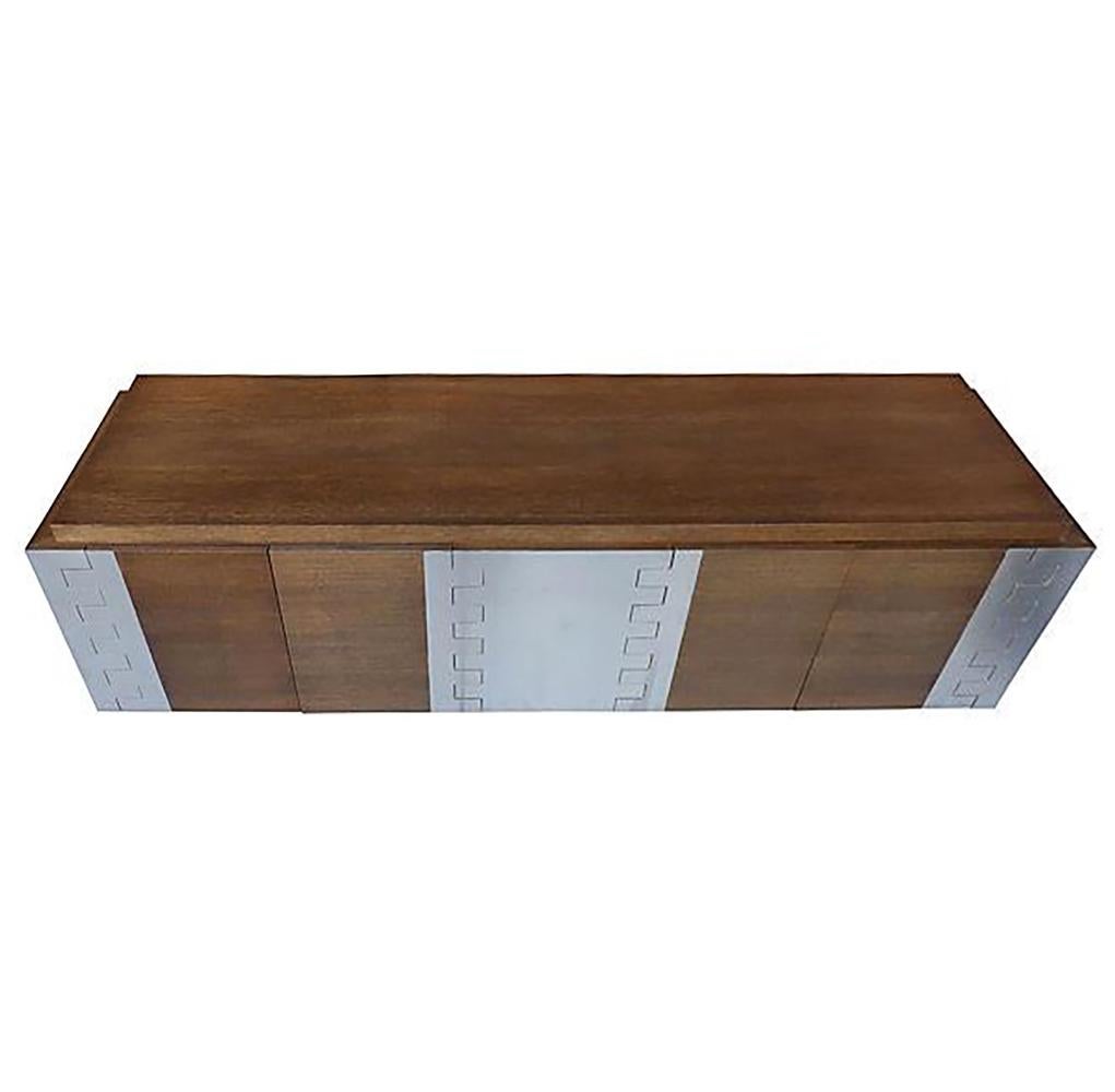

Jamie Herzlinger Oak and Stainless Credenza, Paul Evans Style

Offered for sale is a custom-made rift-cut oak veneer and stainless steel credenza by designer Jamie Herzlinger in the style of Paul Evans. The cabinet offers storage and is signed by