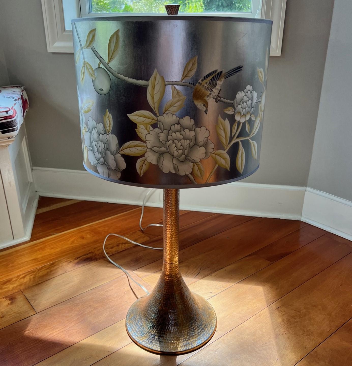 21st c. Jamie Young & Co. hammered cast metal lamp with a hand applied finish that mixes gold and silver leaf to create a platinum tone patina. The drum shade is hand painted paper over linen, made in the USA. This particular shade and base