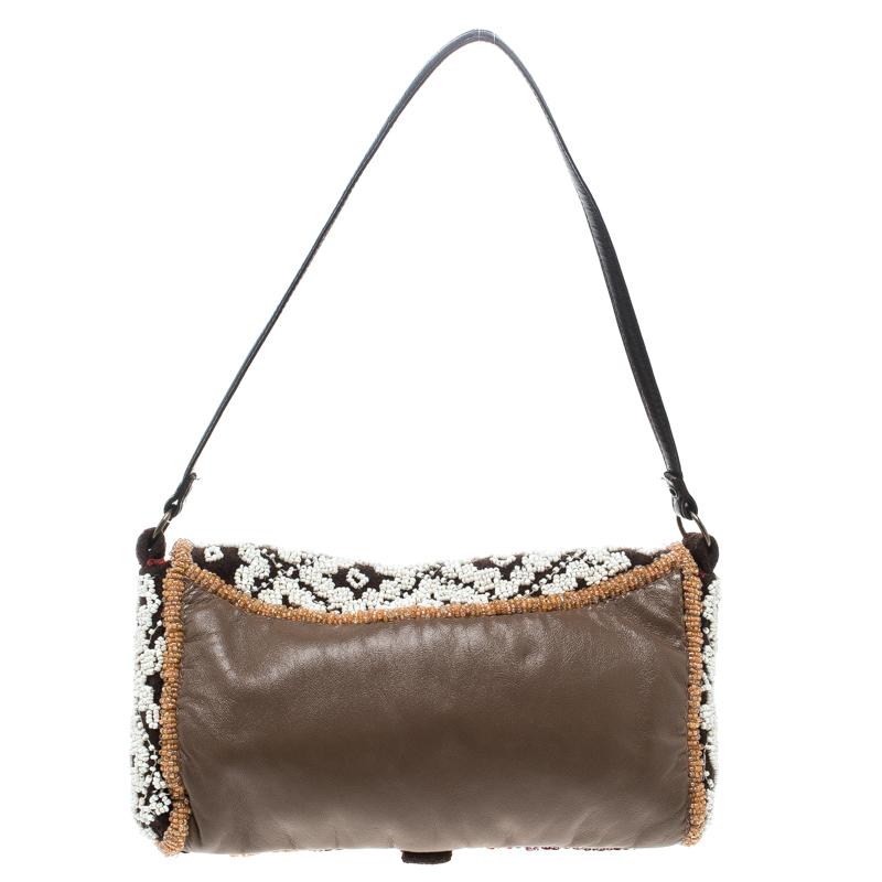 A must-have for every modern lady is this lively multicolored leather handbag having the best quality fabric lining. An example of quality craftsmanship, this Jamin Puech creation can work well for any occasion. It is beautifully embellished with