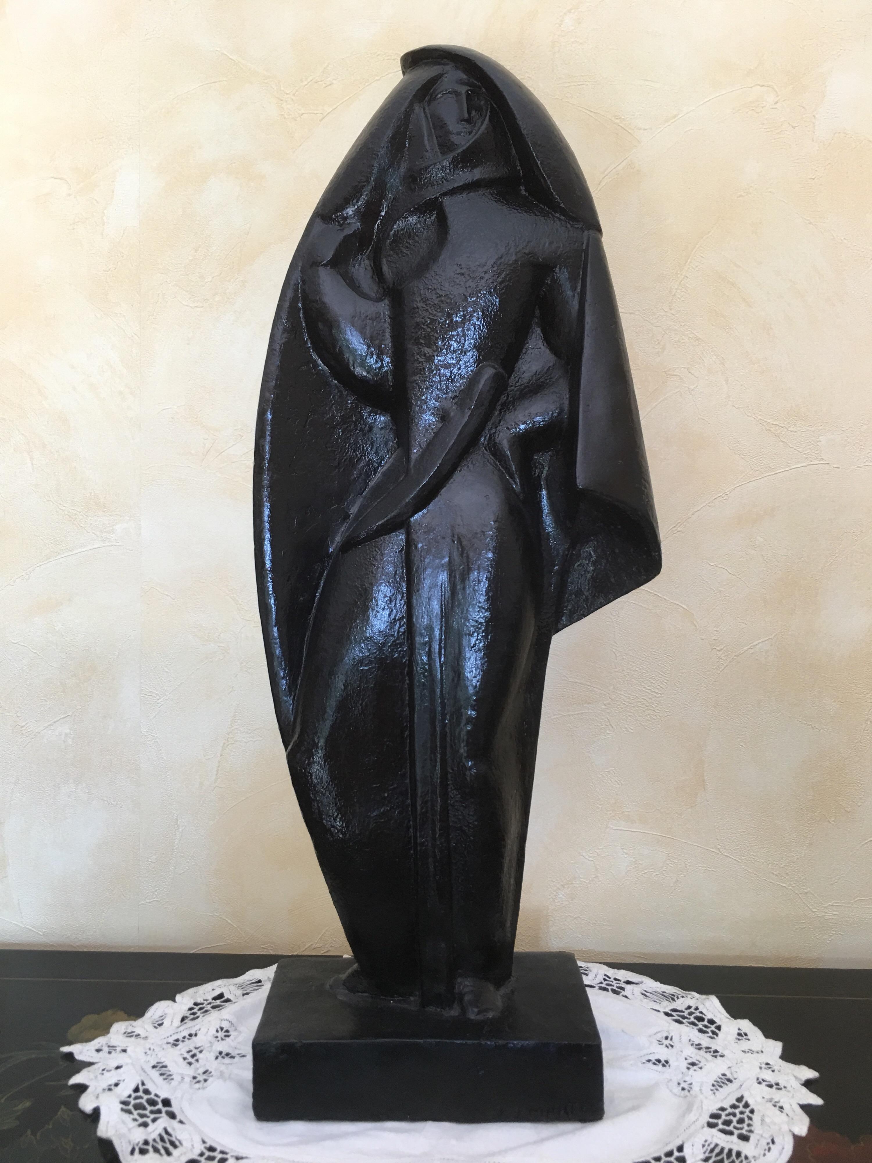 Unique creation in black glazed terracotta made by Jan and Joel Martel in France in 1931. This cubist sculpture represents an 