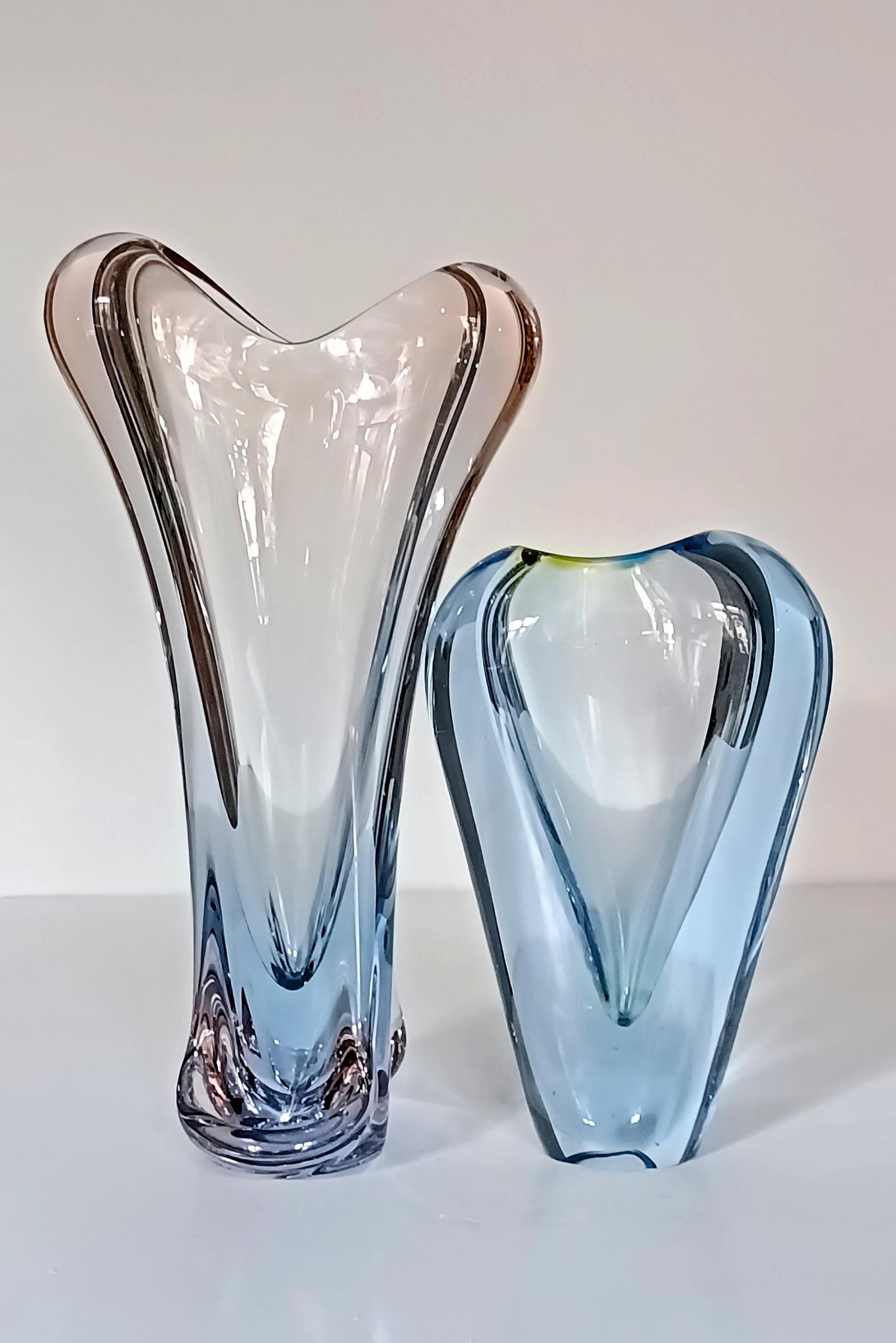 Sculptural pair of glass vases by Jan Beránek for Skrdlovice - hand crafted in the Czech Republic circa the 1950s.

The Beránek glassworks was founded by Emanuel Beránek and his two brothers Bohuslav and Josef, in the village of Skrdlovice in 1941.