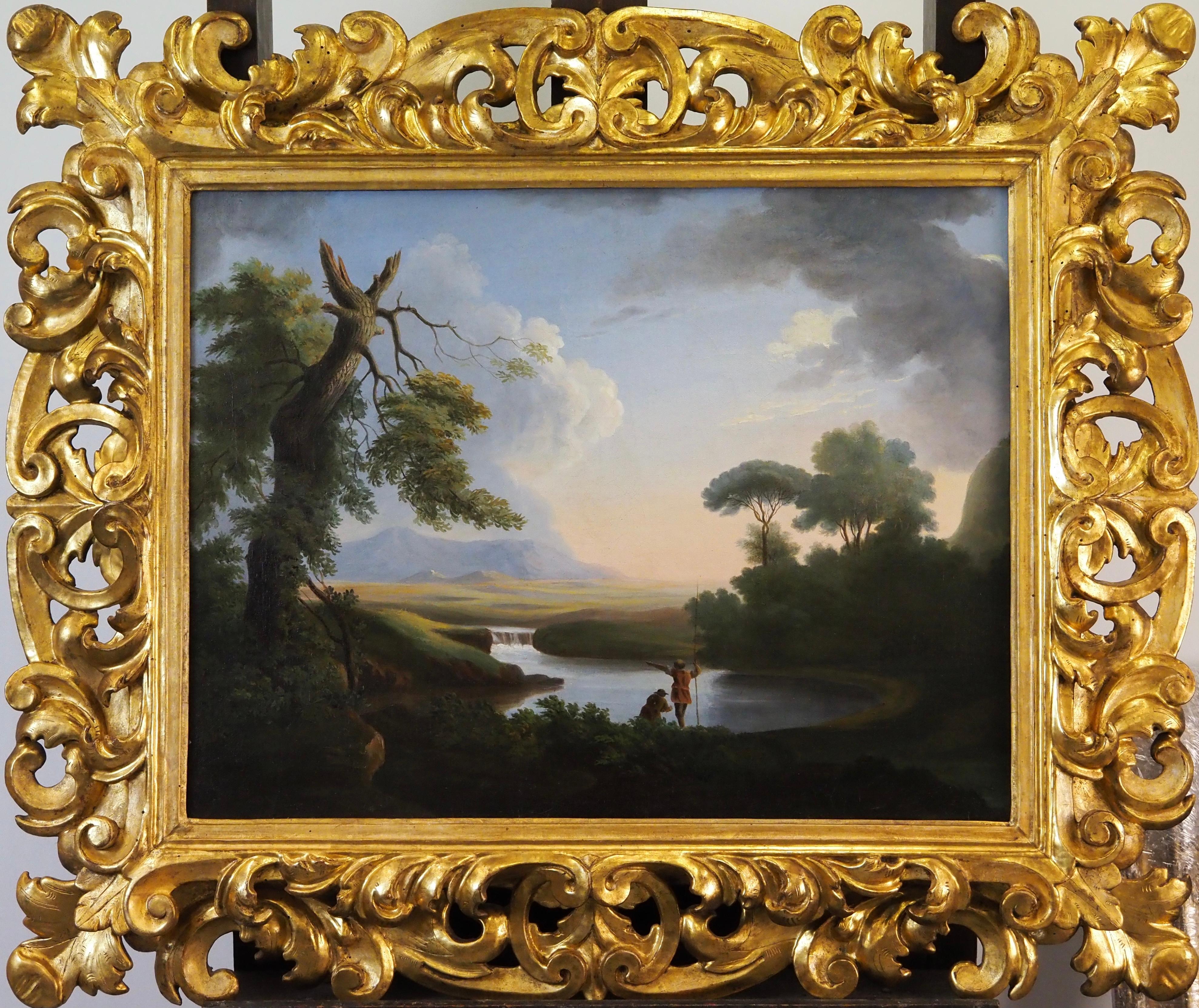 A classical Italianate landscape with figures by a river