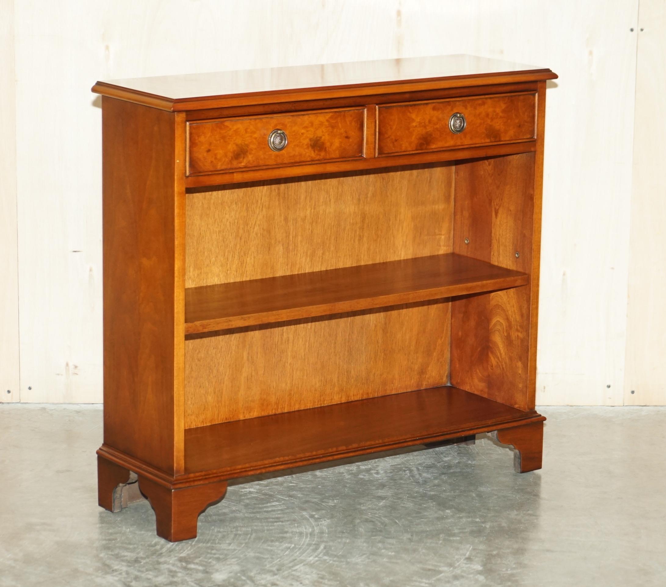 We are delighted to offer for this lovely Jan Smith Furniture Burr Walnut dwarf open library bookcase with twin drawers

A very good looking well made and decorative piece, the shelf is height adjustable and or removable so it can be adjusted to