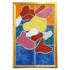 Jan Snoeck, piastrelle in ceramica con forme a forma di zoccolo e colori vivaci in una cornice dorata