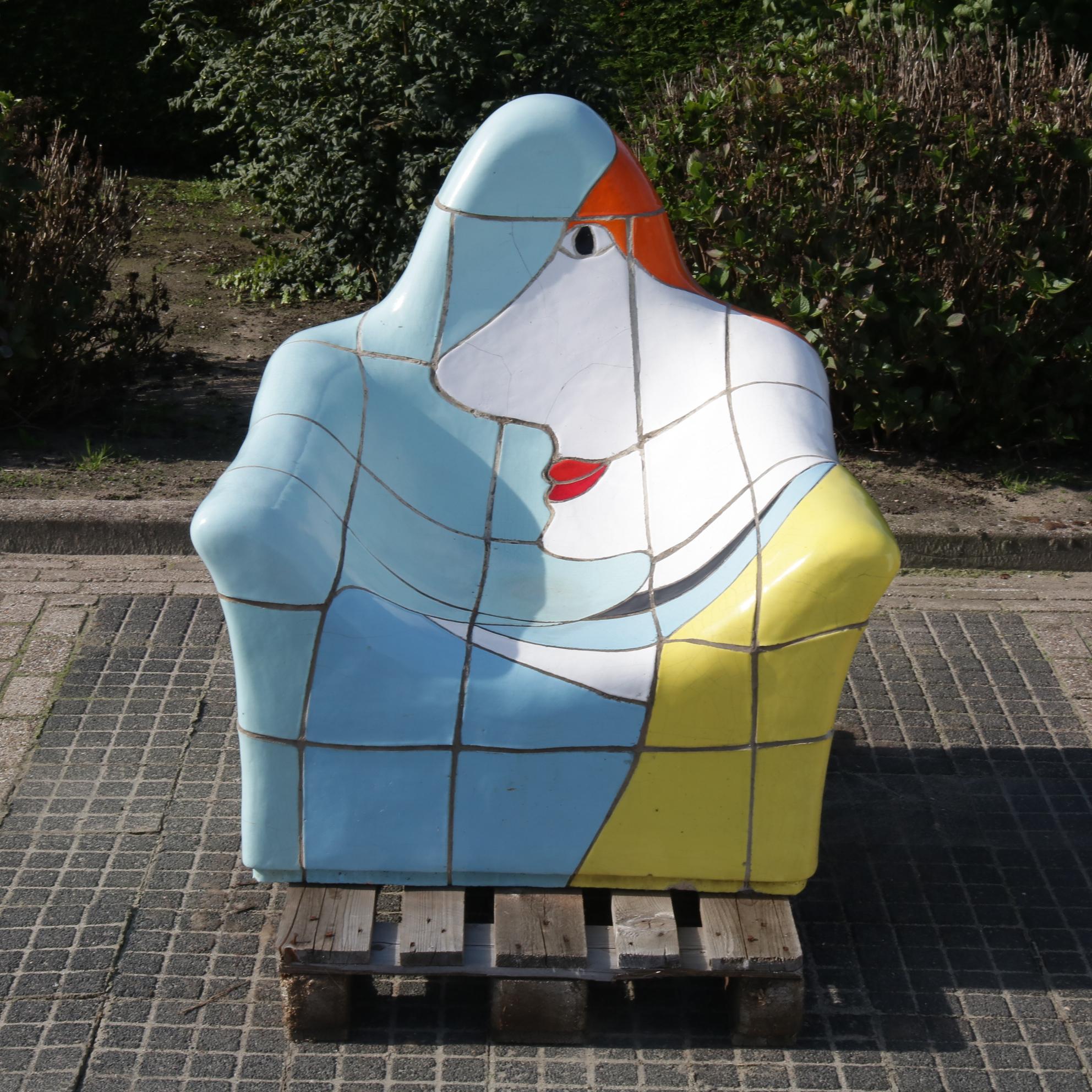 An eye-catching ceramics lounge chair, designed by Jan Snoeck from the the MS Volendam (HAL) in The Hague, the Netherlands, circa 1990.

This is one of the two ceramic chairs that decorated the swimming deck of the MS Volendam (we have photos