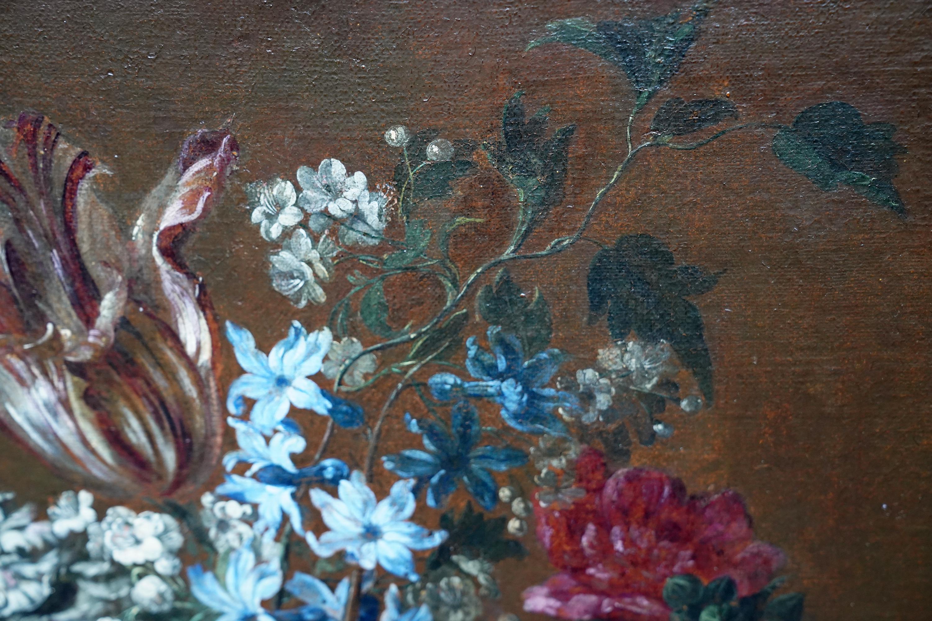 This stunning Golden Age Baroque floral still life oil painting is attributed to the circle of Jan Van Huysum. It is actually part of a pair of paintings in beautiful matching fames and with excellent provenance, a previous owner being Rothschild.