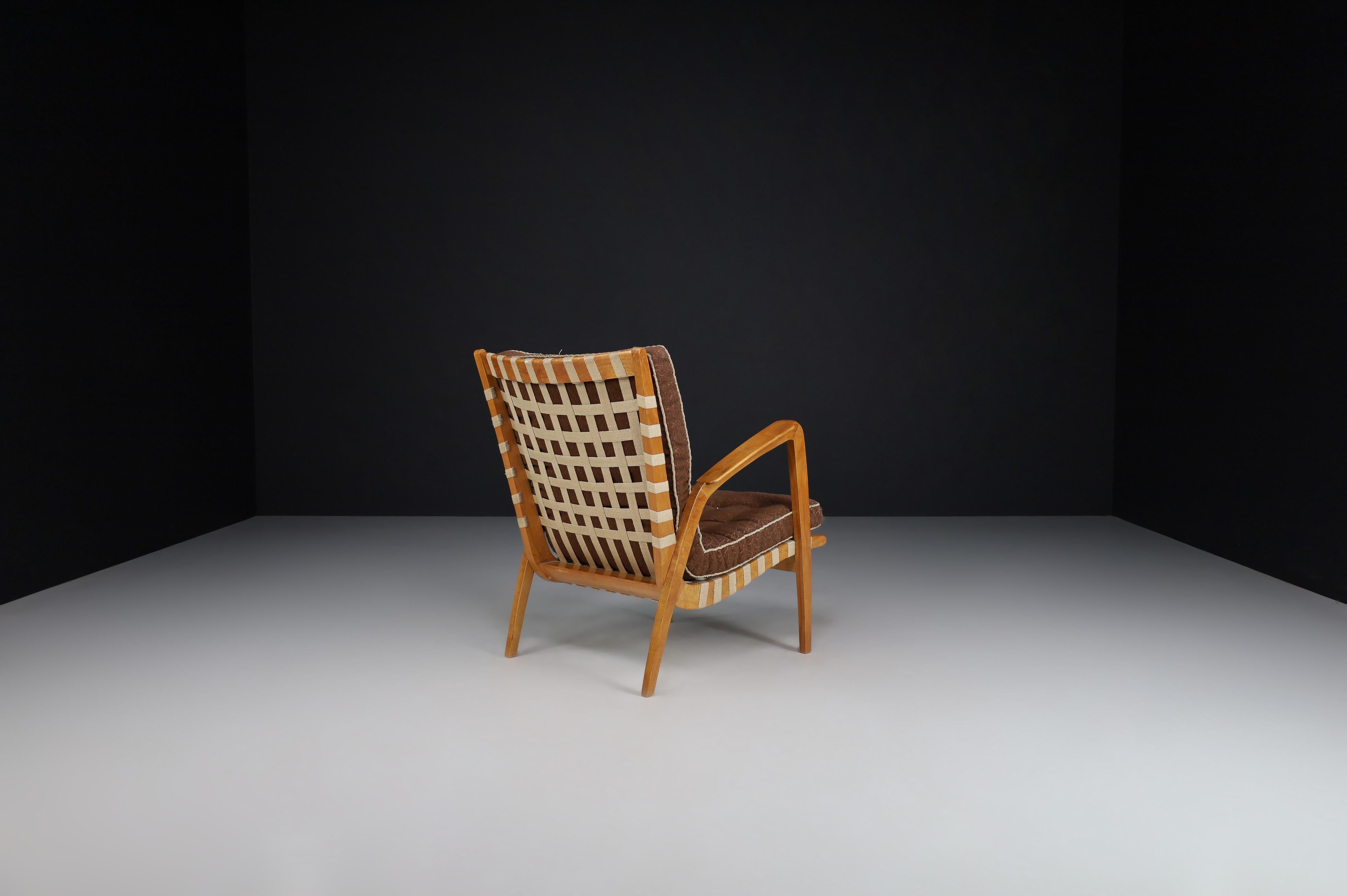 20th Century Jan Vanek Curved Easy Chair in Oak and Woven Canvas Straps, Praque 1930s For Sale