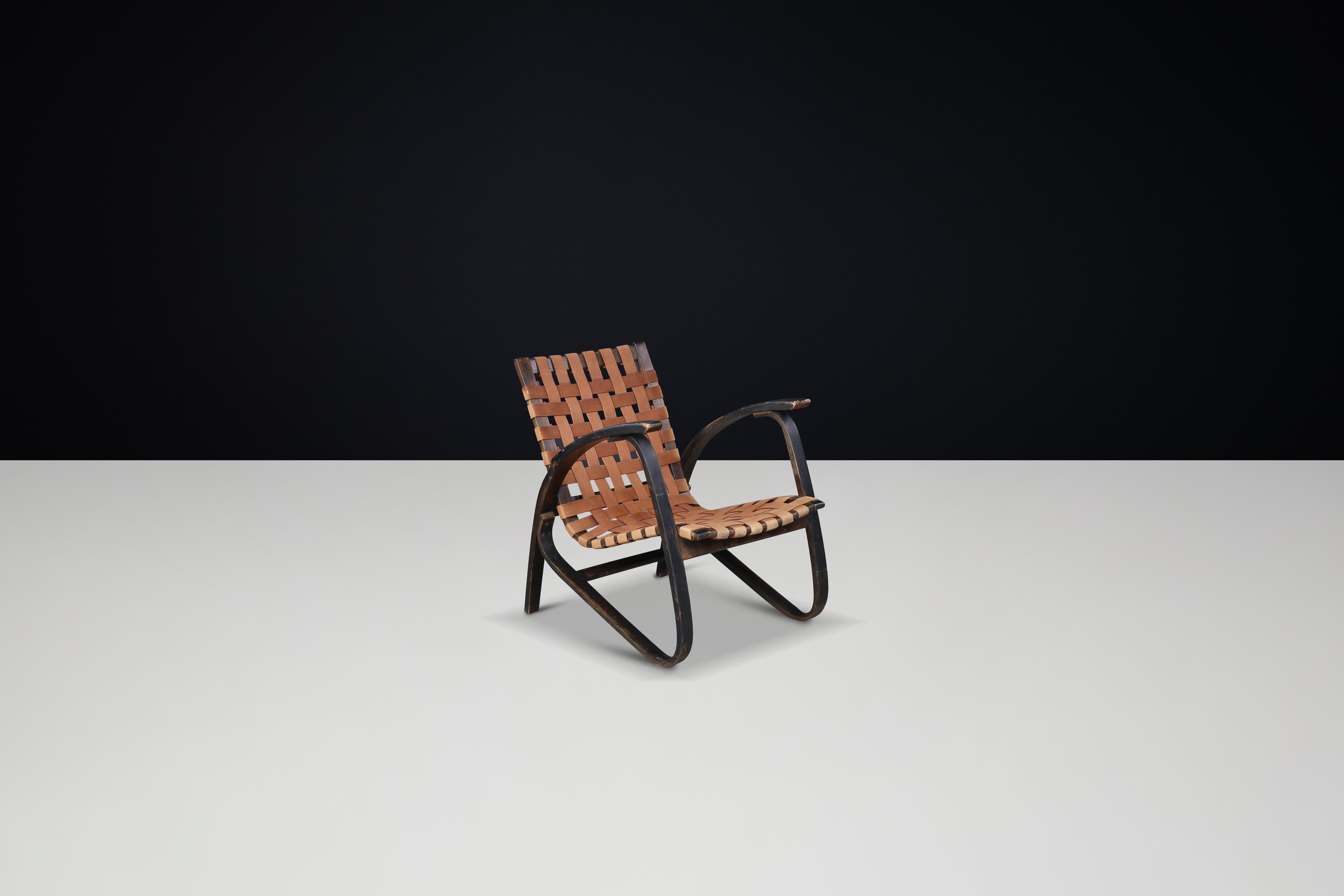 Jan Vanek Lounge chair in bentwood and canvas, Praque, the 1930s

Jan Vanek's easy chair, a remarkable example of mid-century design, is constructed from bentwood and canvas, initially designed in the 1930s in Prague. Vanek, a prominent Czech
