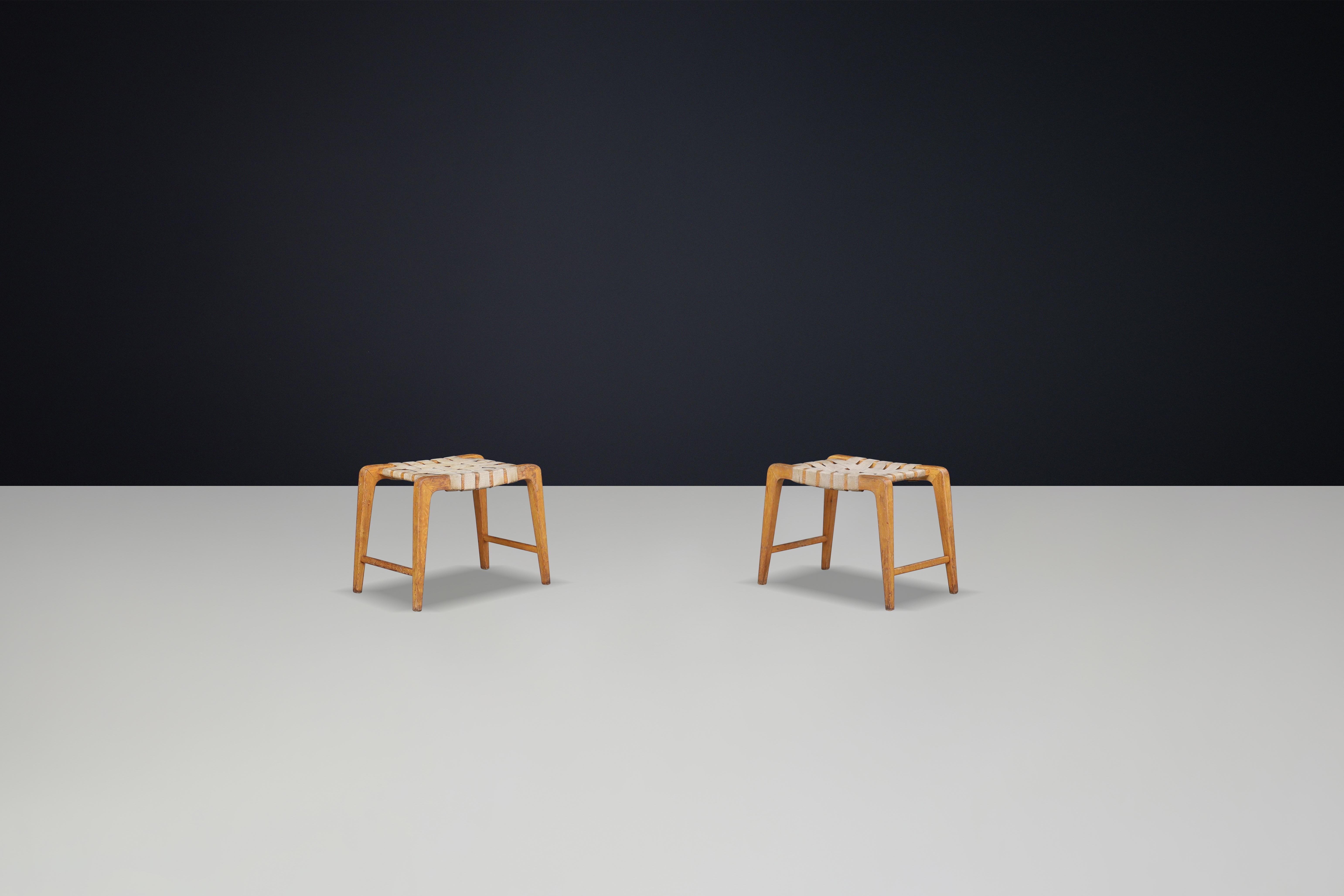 Canvas Jan Vanek sculptural set of two oak stools featuring woven canvas straps, 1940s For Sale