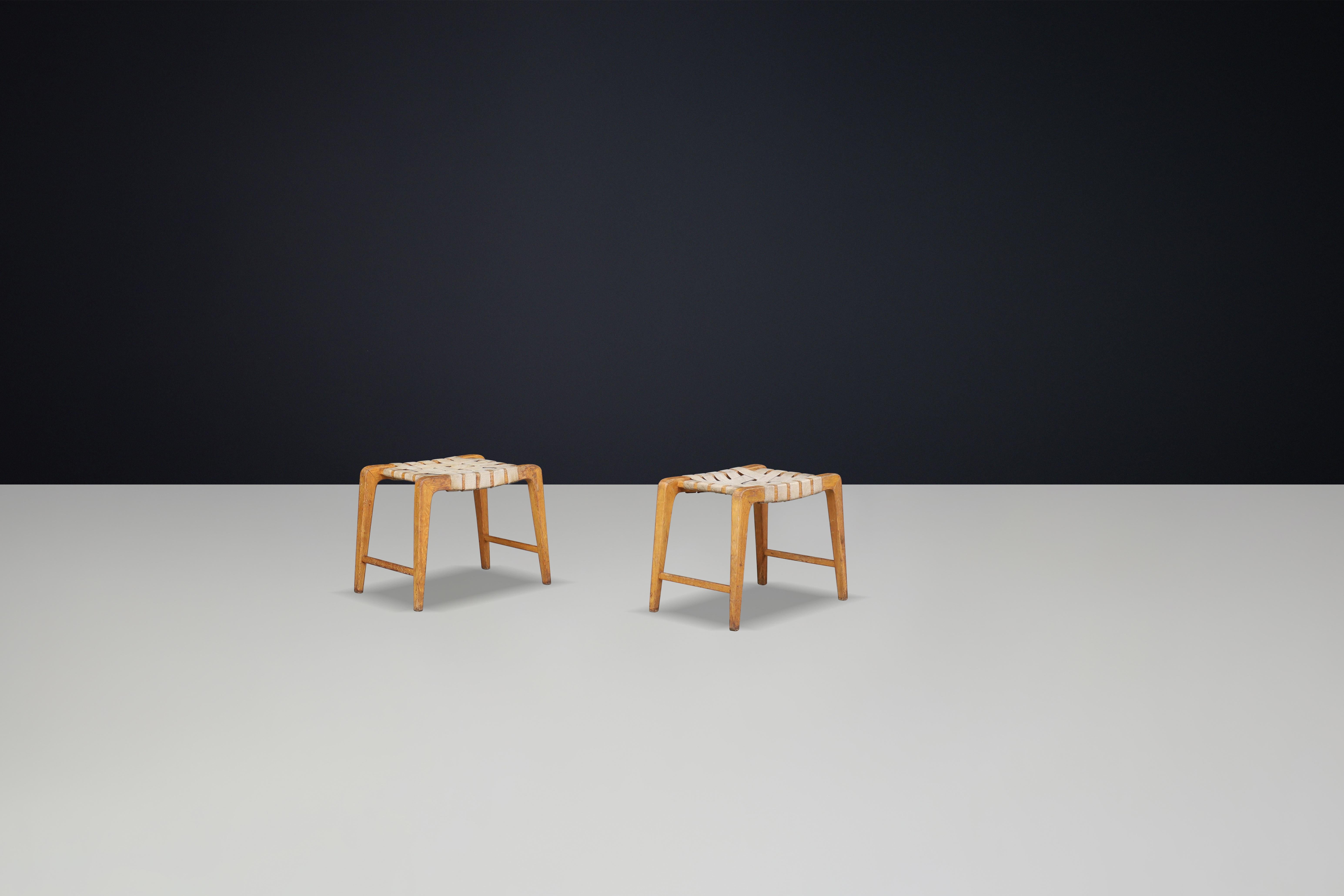 Jan Vanek sculptural set of two oak stools featuring woven canvas straps, 1940s For Sale 1