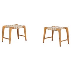 Jan Vanek sculptural set of two oak stools featuring woven canvas straps, 1940s