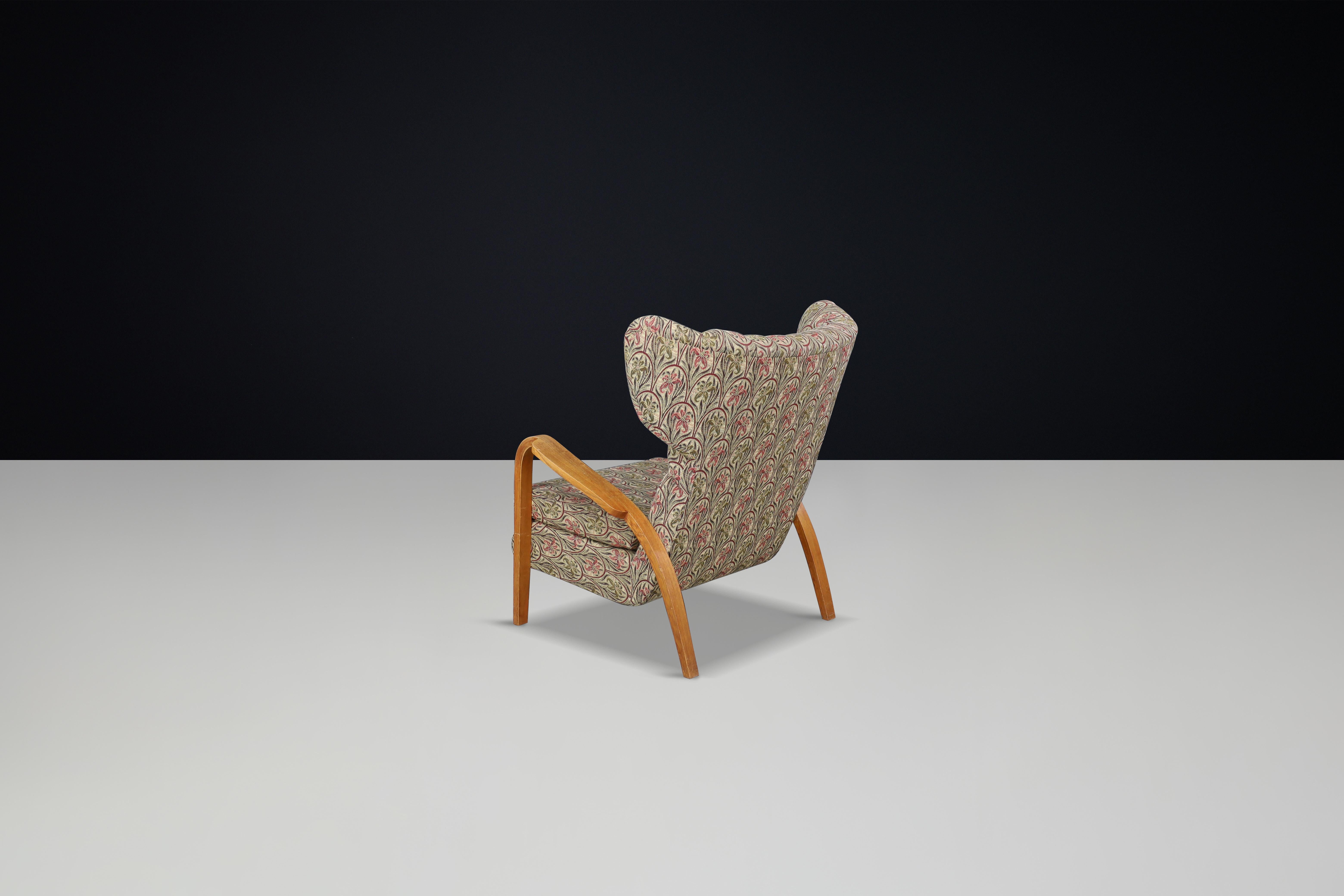 Mid-Century Modern Jan Vanek Wingback Chair in Oak Bentwood and Original Upholstery – Prague, 1940s For Sale