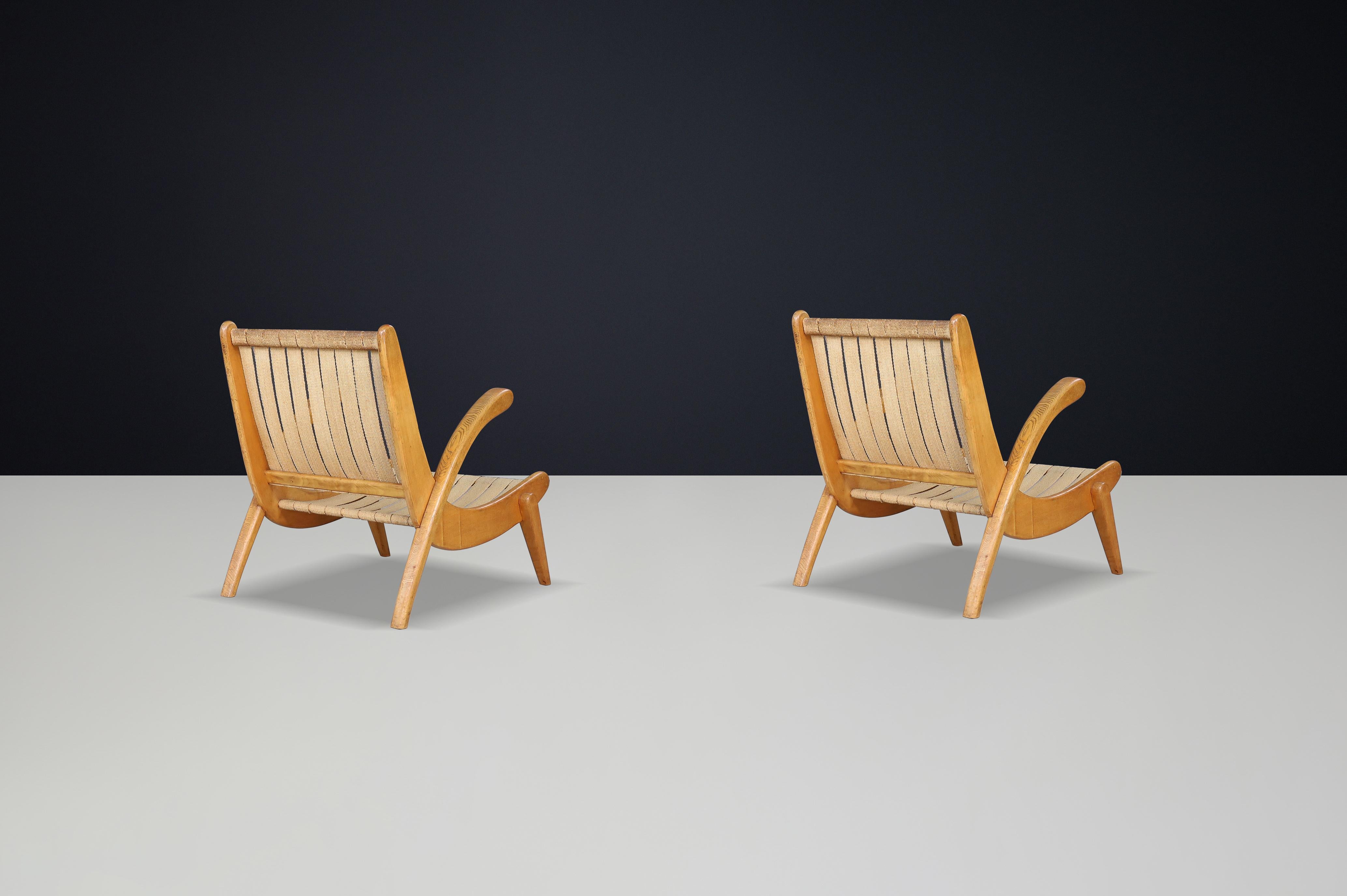 Czech Jan Vanek's curved easy chairs curved oak, canvas and original upholstery 1950s For Sale
