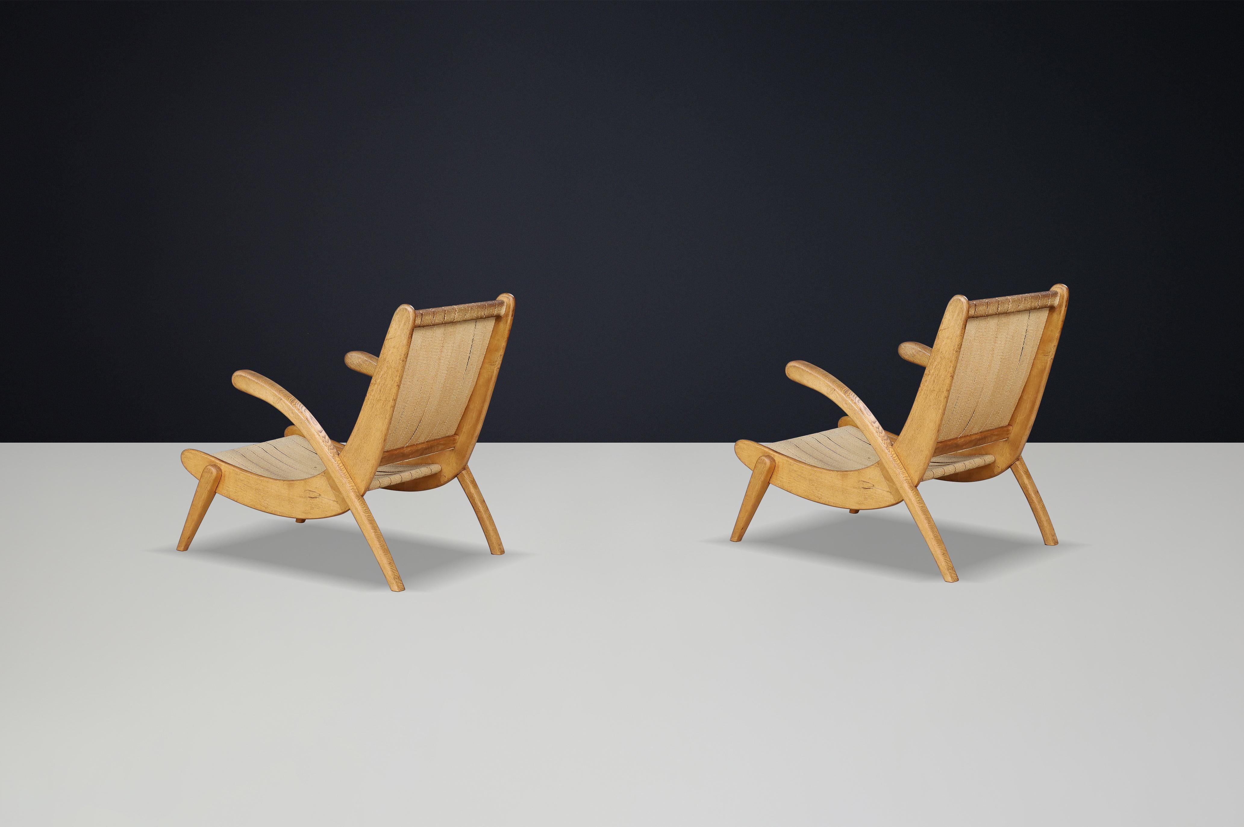 Jan Vanek's curved easy chairs curved oak, canvas and original upholstery 1950s In Good Condition For Sale In Almelo, NL