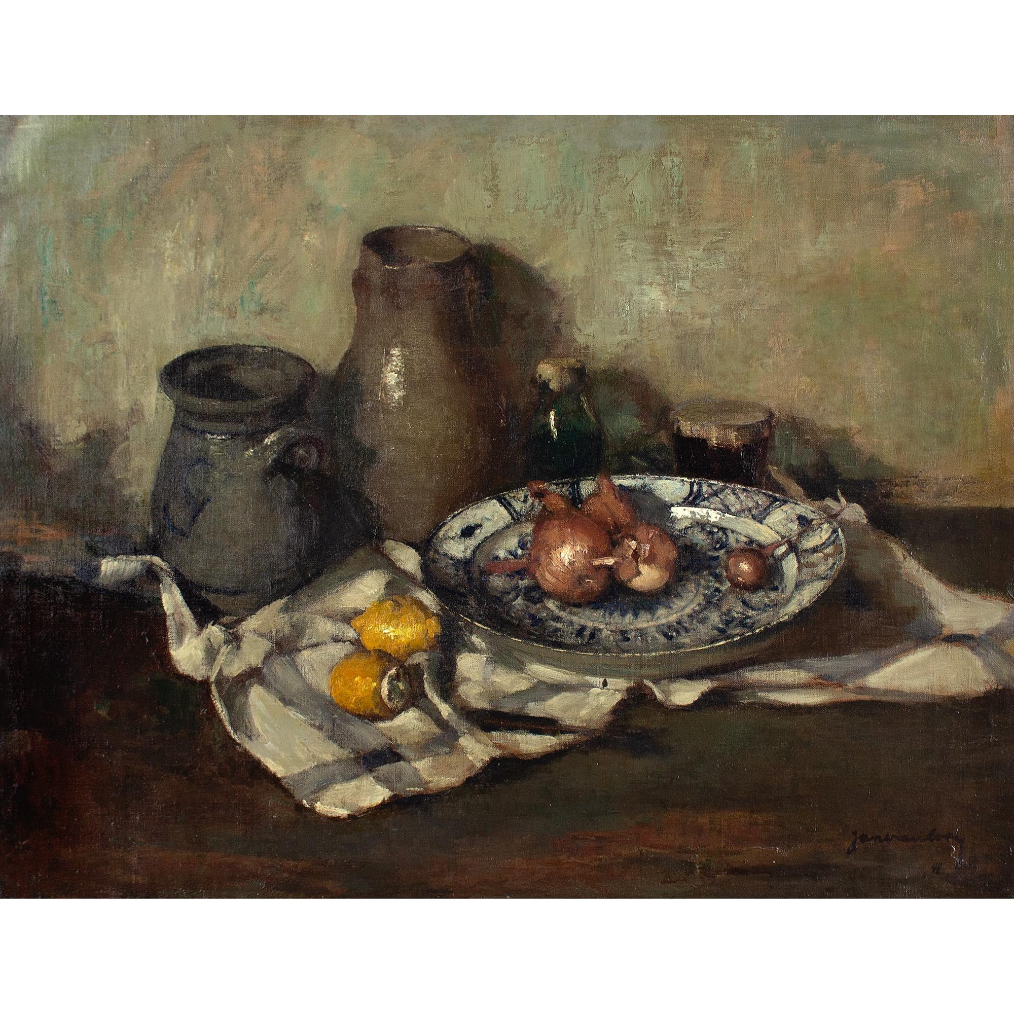 This painterly mid-20th-century oil painting by Belgian artist Jan Van Looy (1882-1971) depicts a still life with ceramics, onions, lemons and tablecloth.

Rendered with passion and acumen, this earthy assortment of objects is far from lifeless. Van
