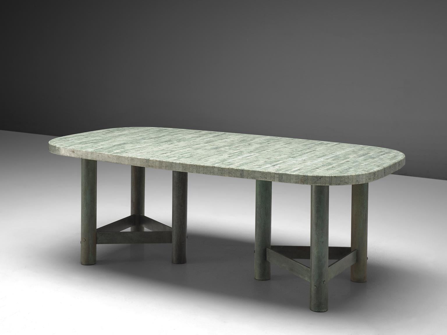Jan Vlug, dining table, marble and patinated bronze, Belgium, 1970s.

Exclusive dining table with characteristic graphical base and oval marble top. The star-shaped base made patinated metal consists of six legs. The repeated rhythm of the legs is