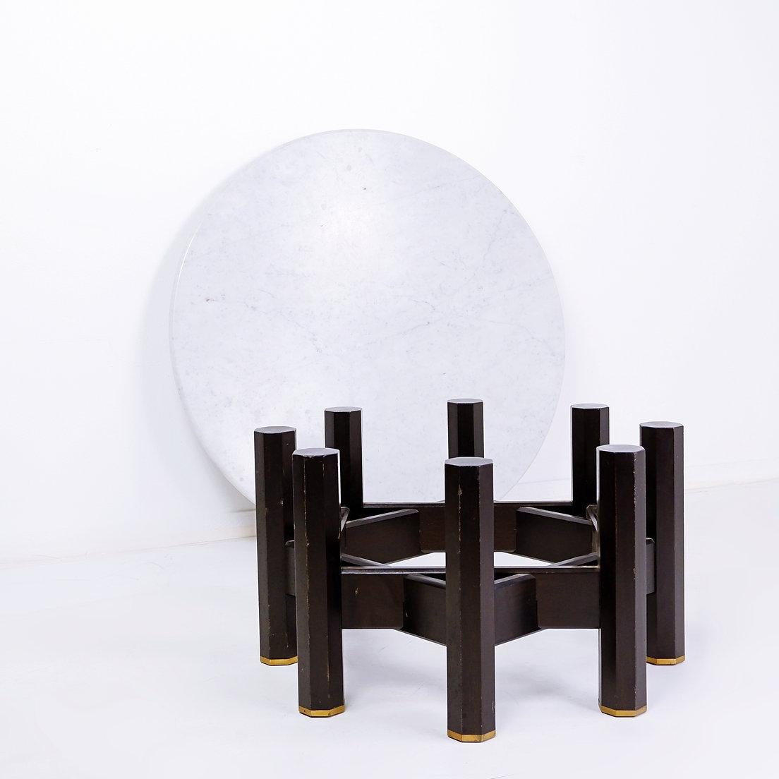 Jan Vlug Coffee Table with Round Marble Top - 1970s - Belgium
Jan Vlug - Marble - Vintage - Mid Century
Measures : 85.5cm diam H: 36cm Top: 2cm 
Materials : Marble - wood - Brass 
Wear consistent with age and use : Minor Losses - see Photos 
 