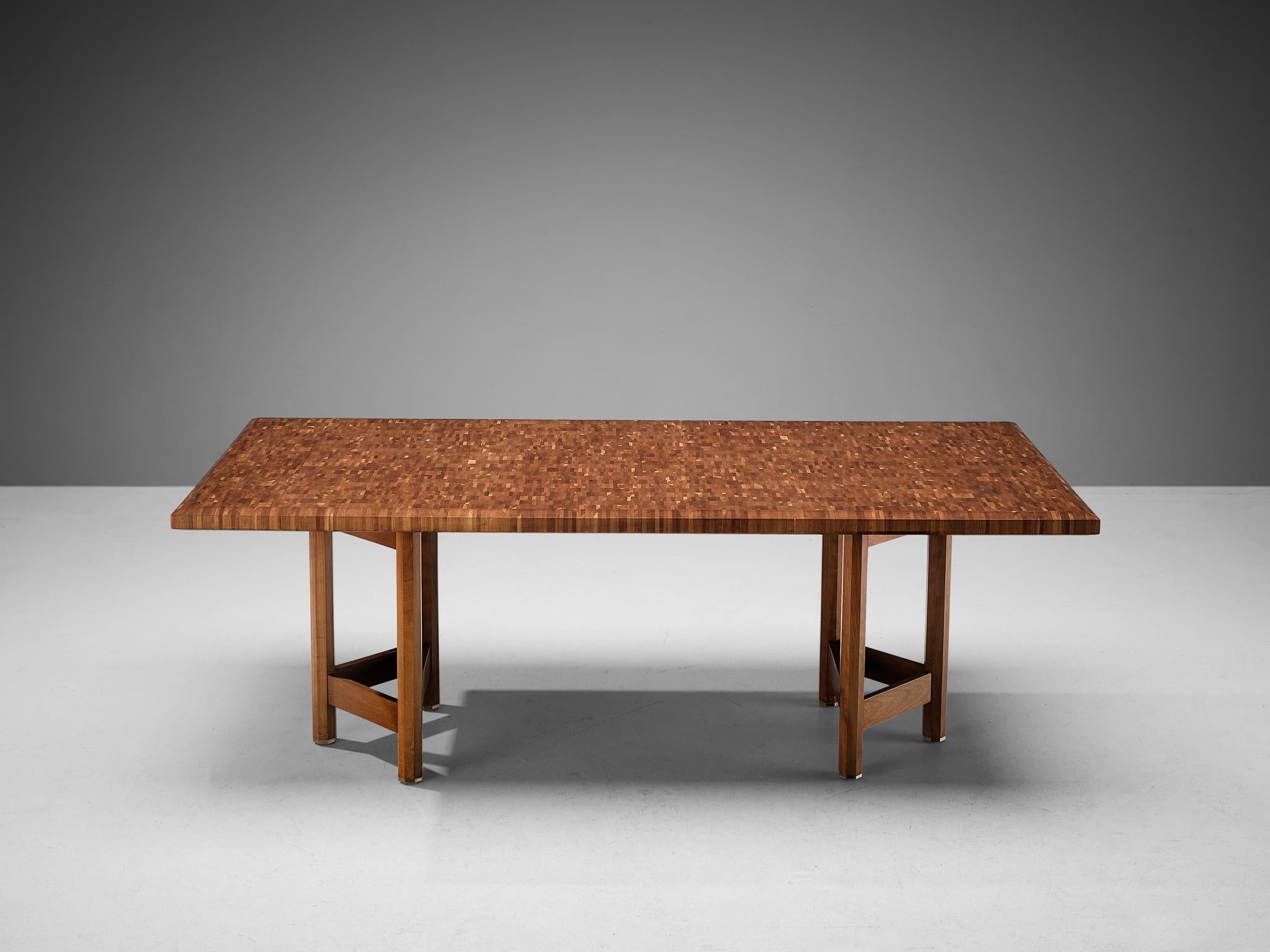 Jan Vlug, dining table, walnut, metal, brass, Belgium, 1970s

Glorious and rare dining table with characteristic and stunning executed tabletop. The table is made by Belgian designer Jan Vlug. Apart from the table top that catches the eye, the two