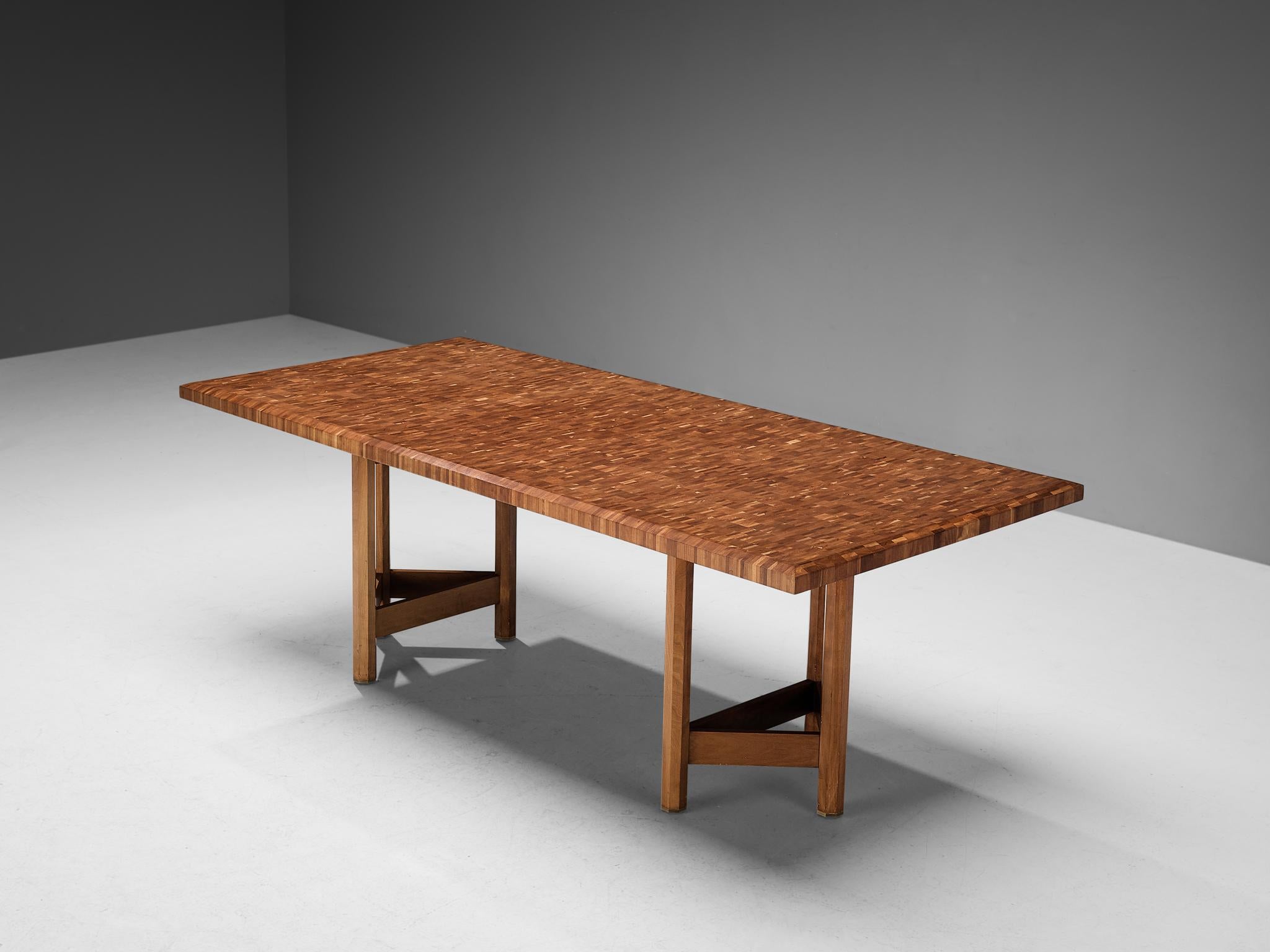 Jan Vlug, dining table, walnut, metal, brass, Belgium, 1970s

Glorious and rare dining table with characteristic and stunning executed tabletop. The table is made by Belgian designer Jan Vlug. Apart from the table top that catches the eye, the two