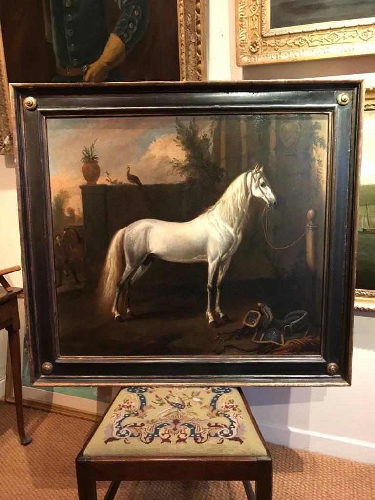 Jan WYCK (1652-1702, Dutch)
The Grey Arabian
oil on canvas
78 x 88 cm canvas size
108 x 98 cm; inc frame



This magnificent work by Jan Wyck must be regarded as one of the most significant examples of early equestrian art in England. It has an