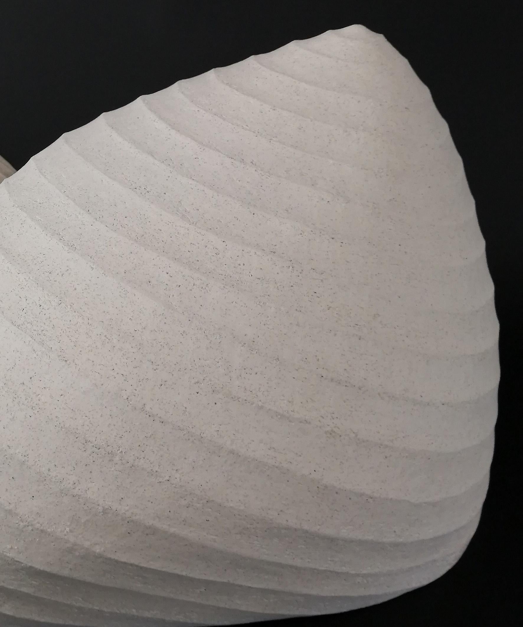 This abstract ceramic indoor sculpture was inspired by nature.

The enigmatic and compelling ceramics by Canadian artist Jana Osterman are influenced in form, pattern, texture, and color by the natural world. This bodacious sculpture is reminiscent