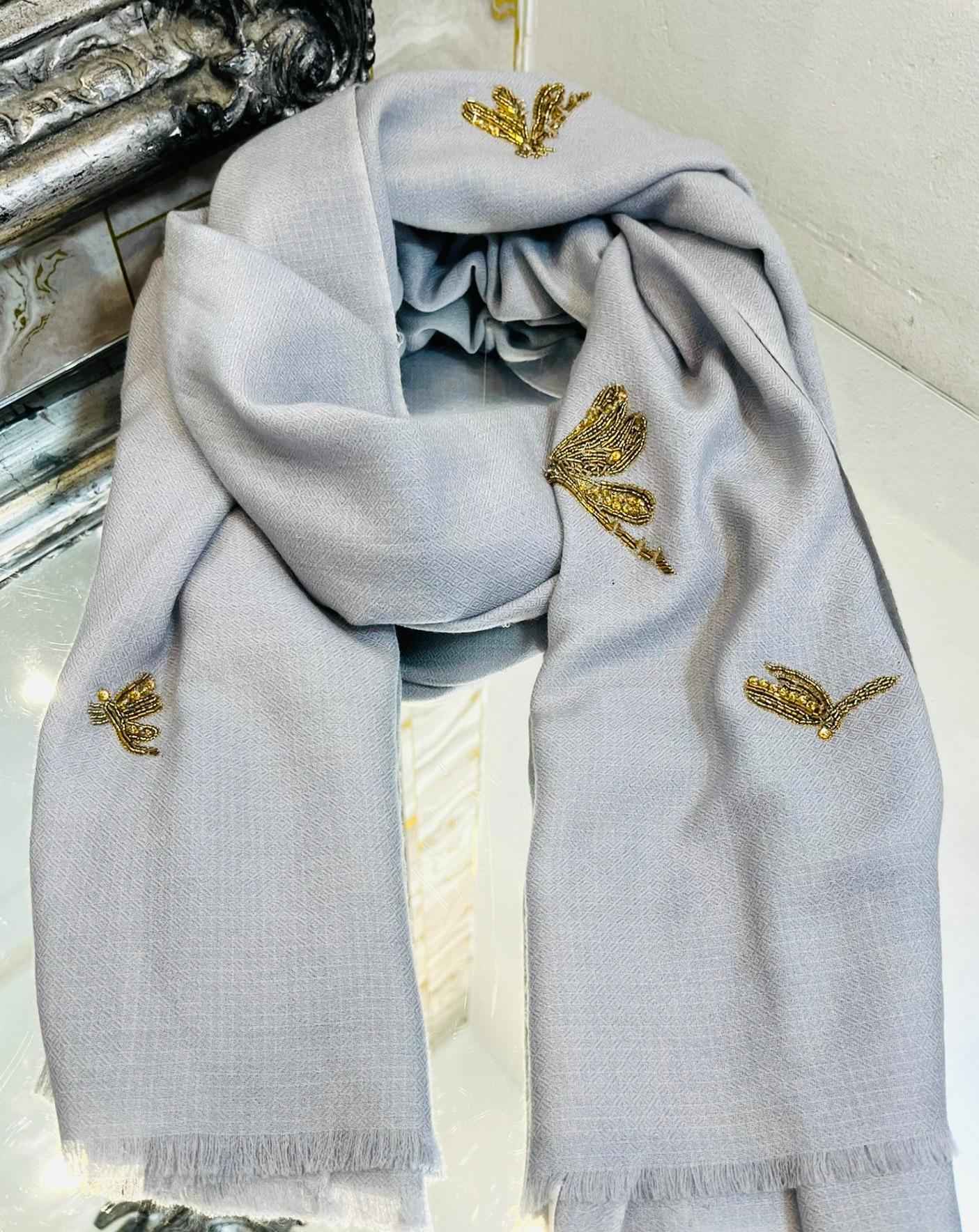 Janavi Beaded Dragonfly Merino Wool Scarf

Grey, handcrafted scarf designed with gold and brown beaded dragonfly motifs throughout.

Featuring fringed trims and soft-brushed texture.

Size – 198cm x 136cm

Condition – Good (General signs of