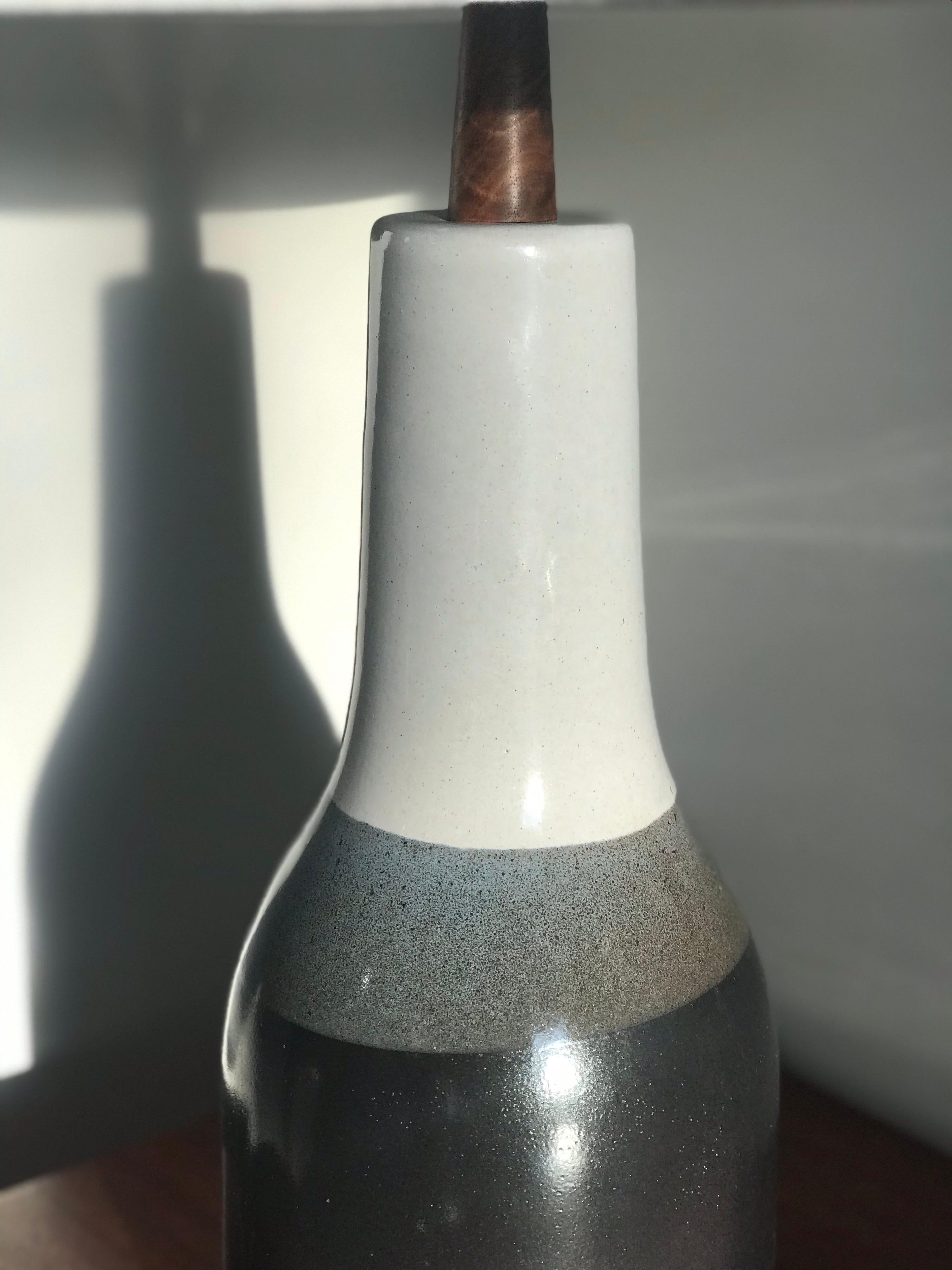 Stunning table lamp by famed ceramicist duo Jane and Gordon Martz for Marshall Studios. Unusual glaze with cascading color palette. 

Measures: Overall
29” tall
15 wide  

Ceramic portion:
14.5” tall
6.5