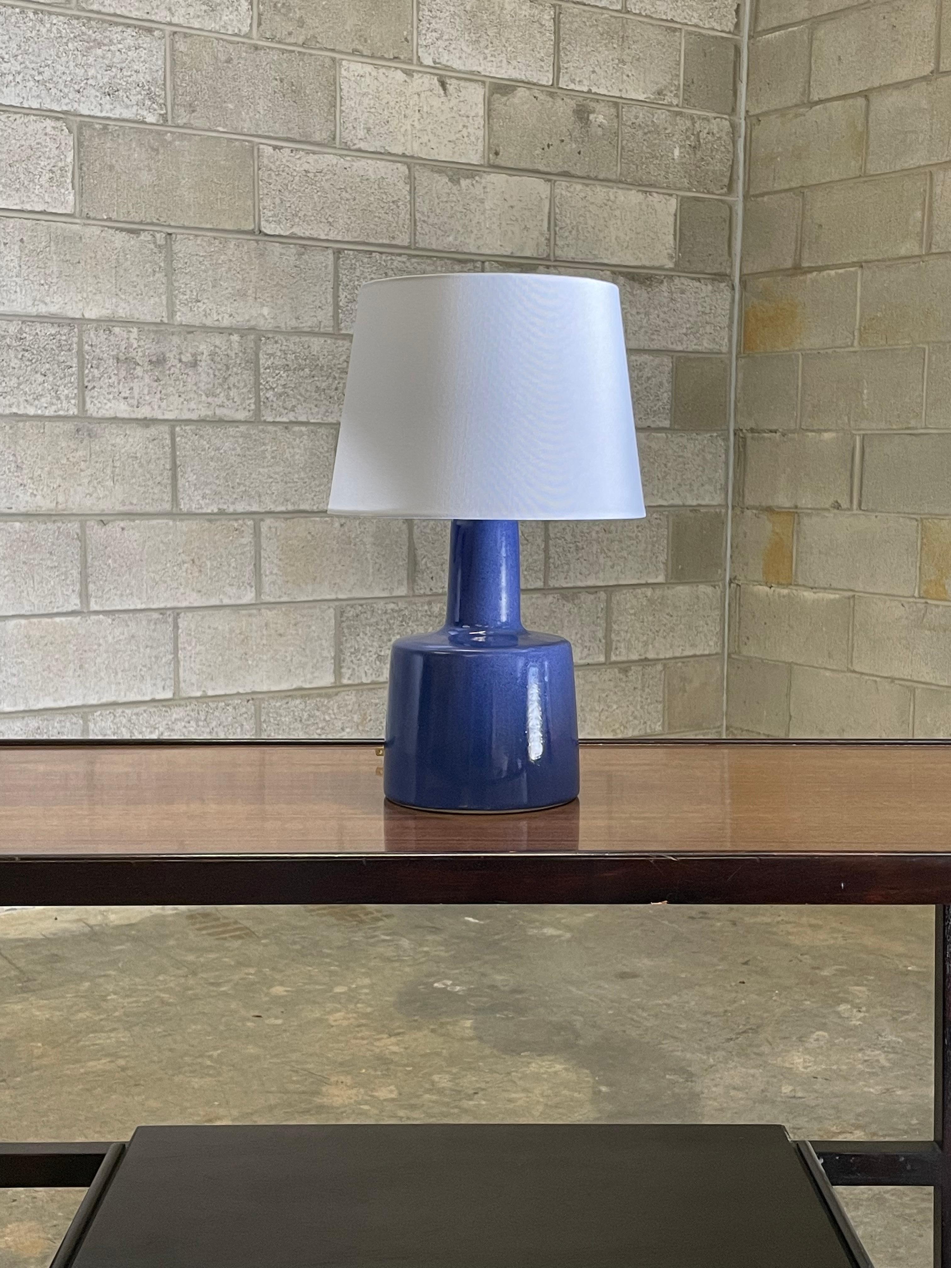 Table lamp designed by famed ceramicist duo Jane and Gordon Martz for Marshall Studios. Great royal blue color. 

Overall: 
16” tall
10” wide 

Ceramic: 
9” tall 
6