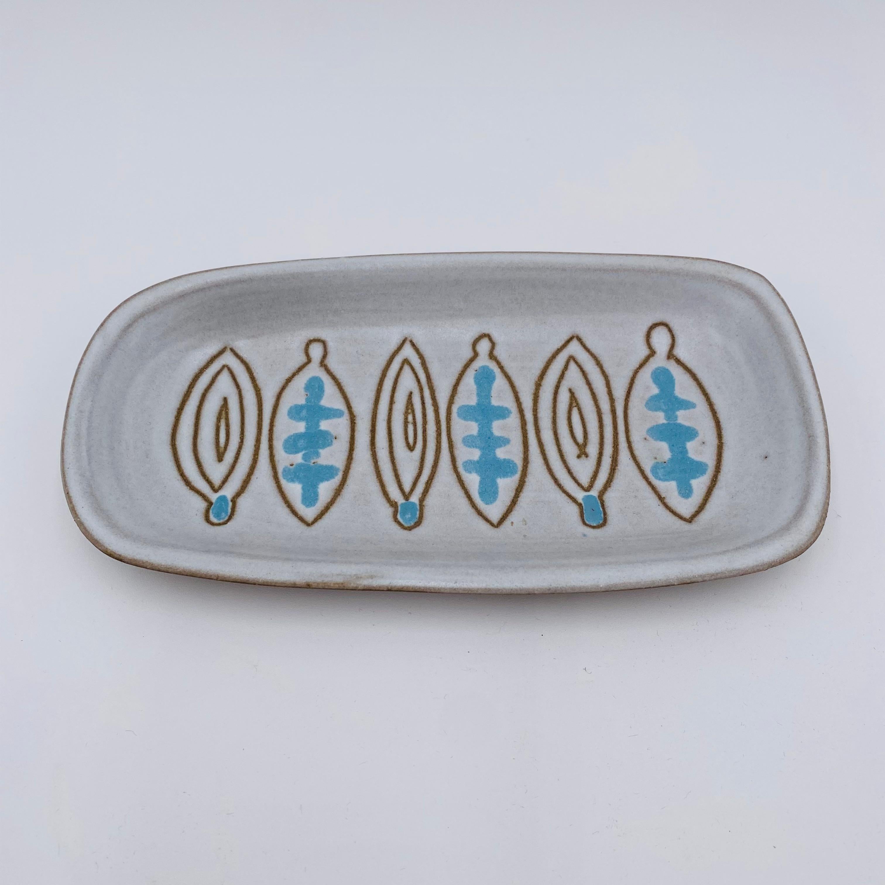 Dish, tray, or catch-all by Jane and Gordon Martz for their company, Marshall Studios. Natural clay, brushed multicolor glaze in a geometric pattern. Hand-signed underneath Marshall Studios sticker. 1950s USA.