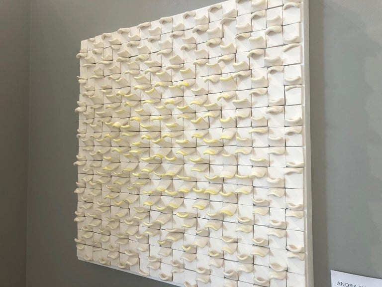 Allegro I / ceramic wall sculpture - white with ivory / yellow - Sculpture by Jane B. Grimm