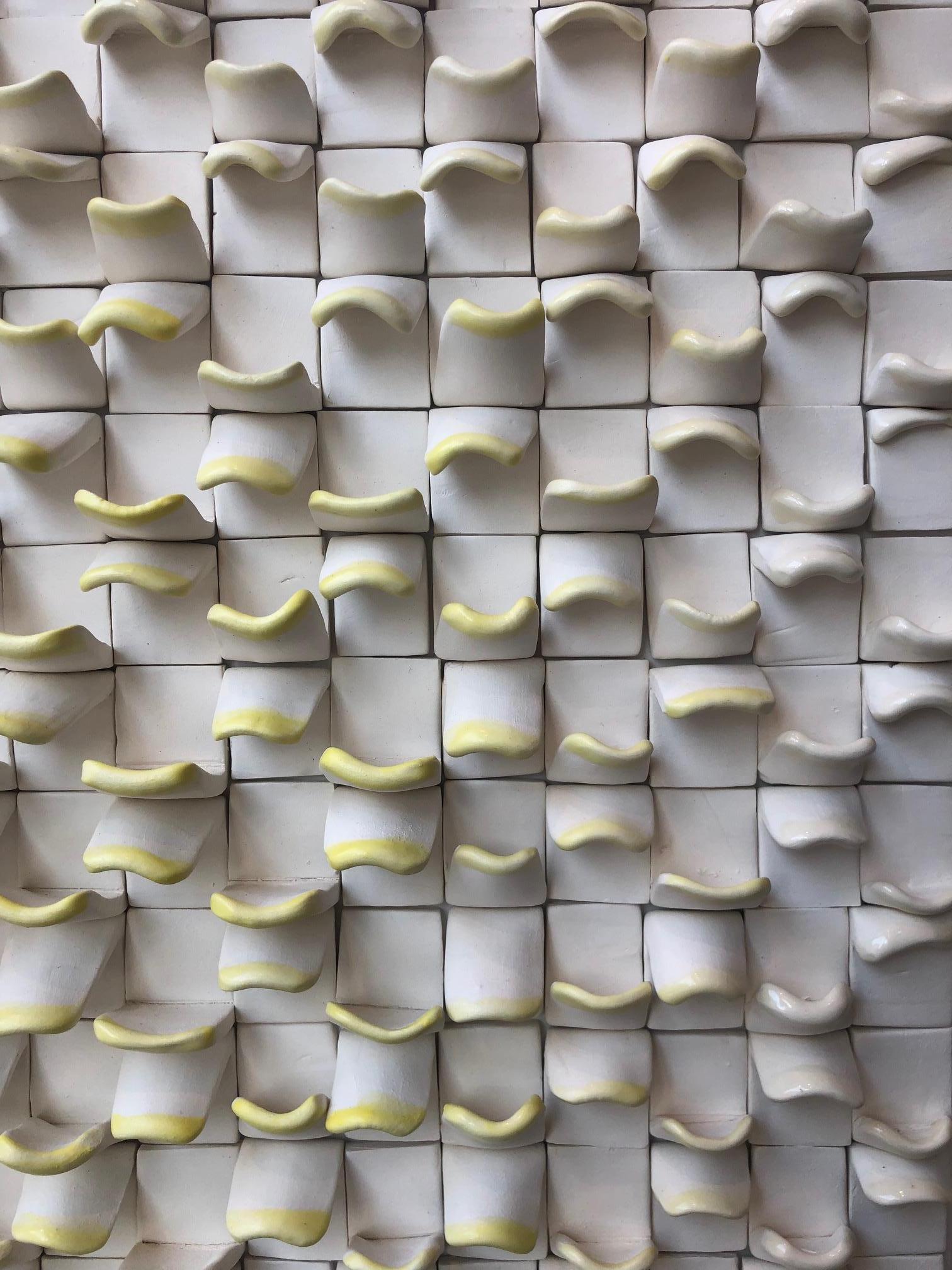 Allegro I / ceramic wall sculpture - white with ivory / yellow - Brown Abstract Sculpture by Jane B. Grimm