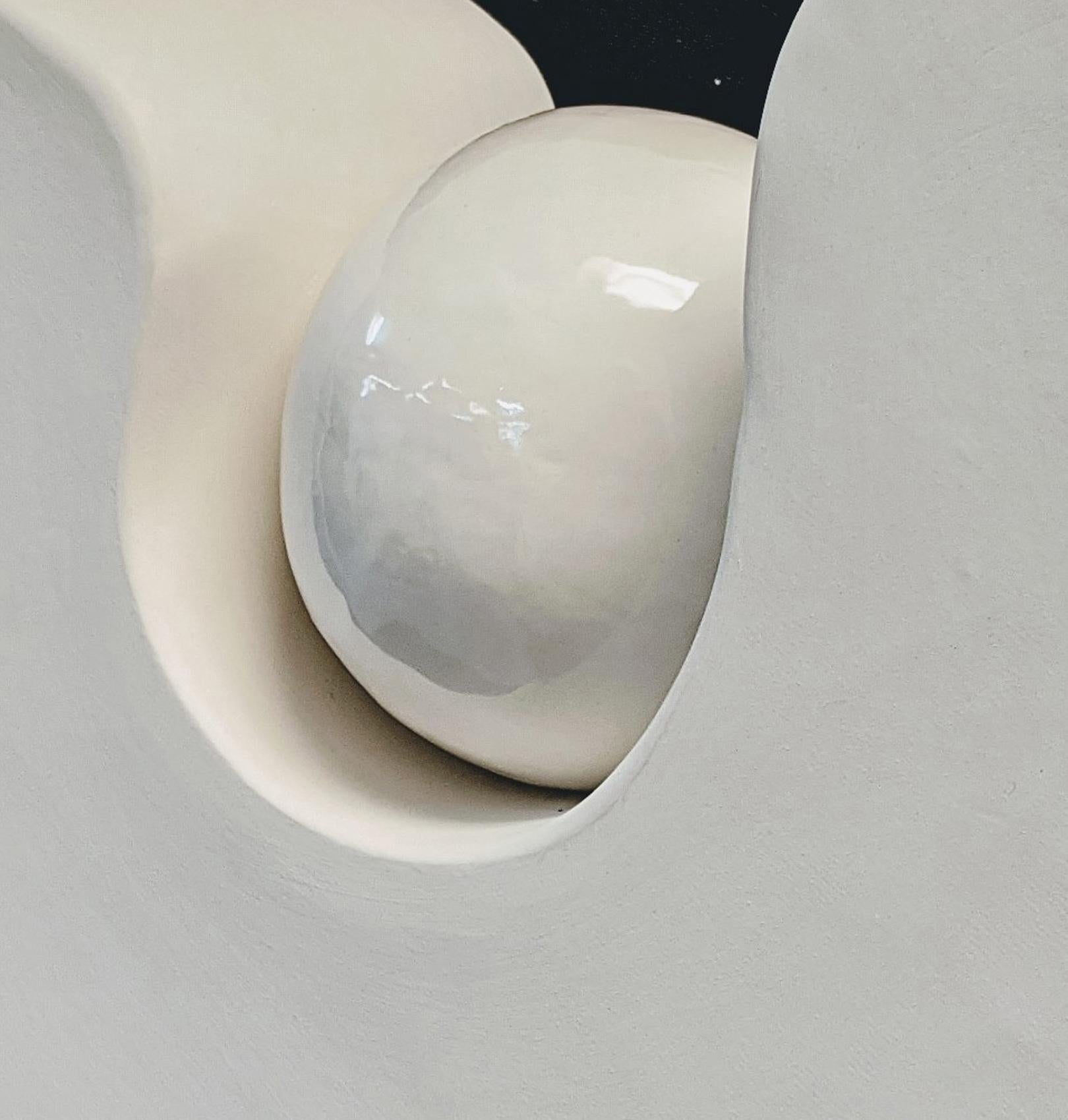 Jane B Grimm
Rhapsody VII, 2020
ceramic 15 x 21 x 5 in

White amorphic abstract sculpture with ball, created with hand formed ceramic. Dimensions are 15 x 21 x 5 inches. A wonderful ceramic sculpture by Jane B. Grimm who began her artistic career in