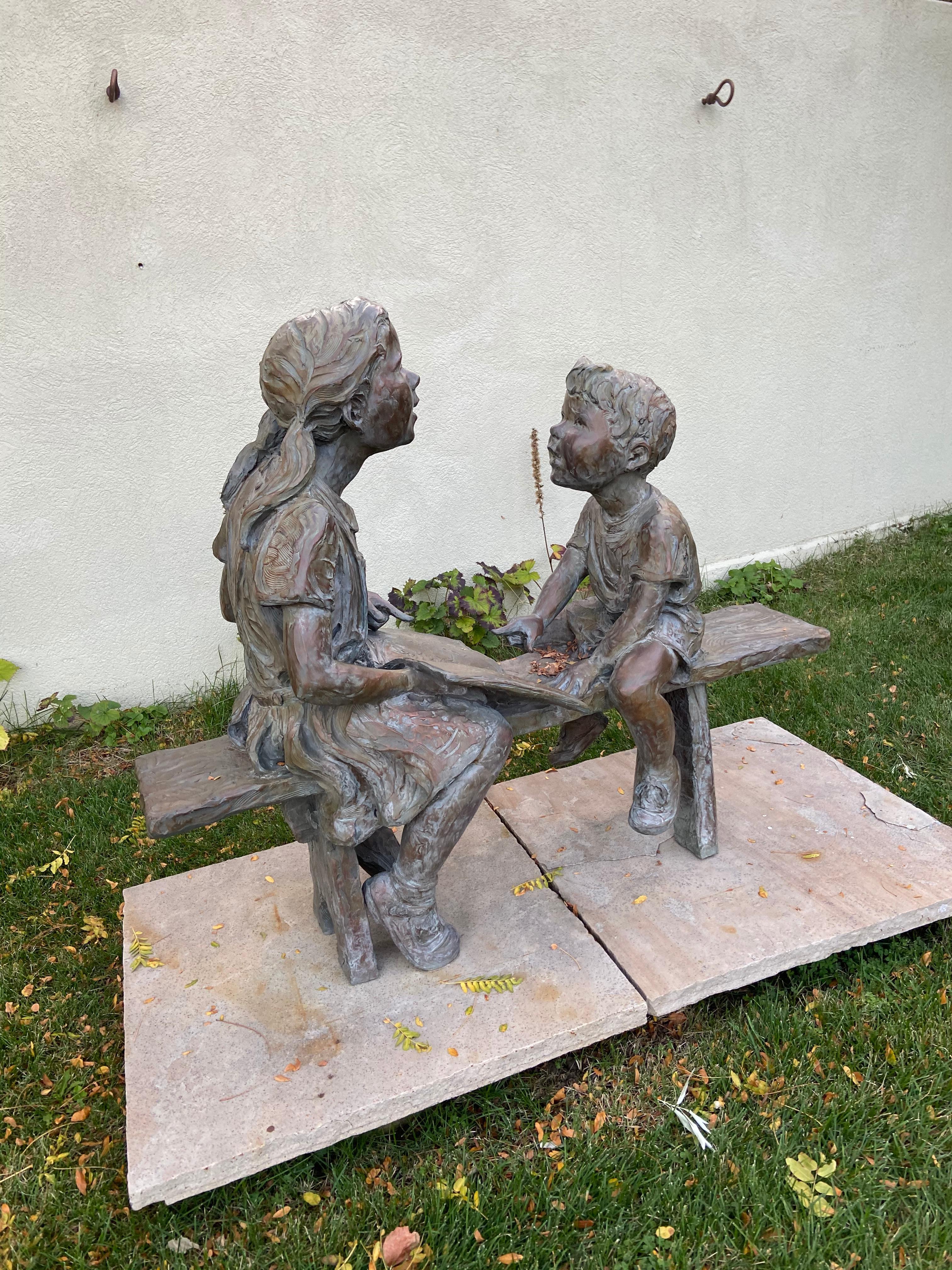A World to Teach by Jane DeDecker
Figurative Bronze Sculpture functioning as bench
44x53x22