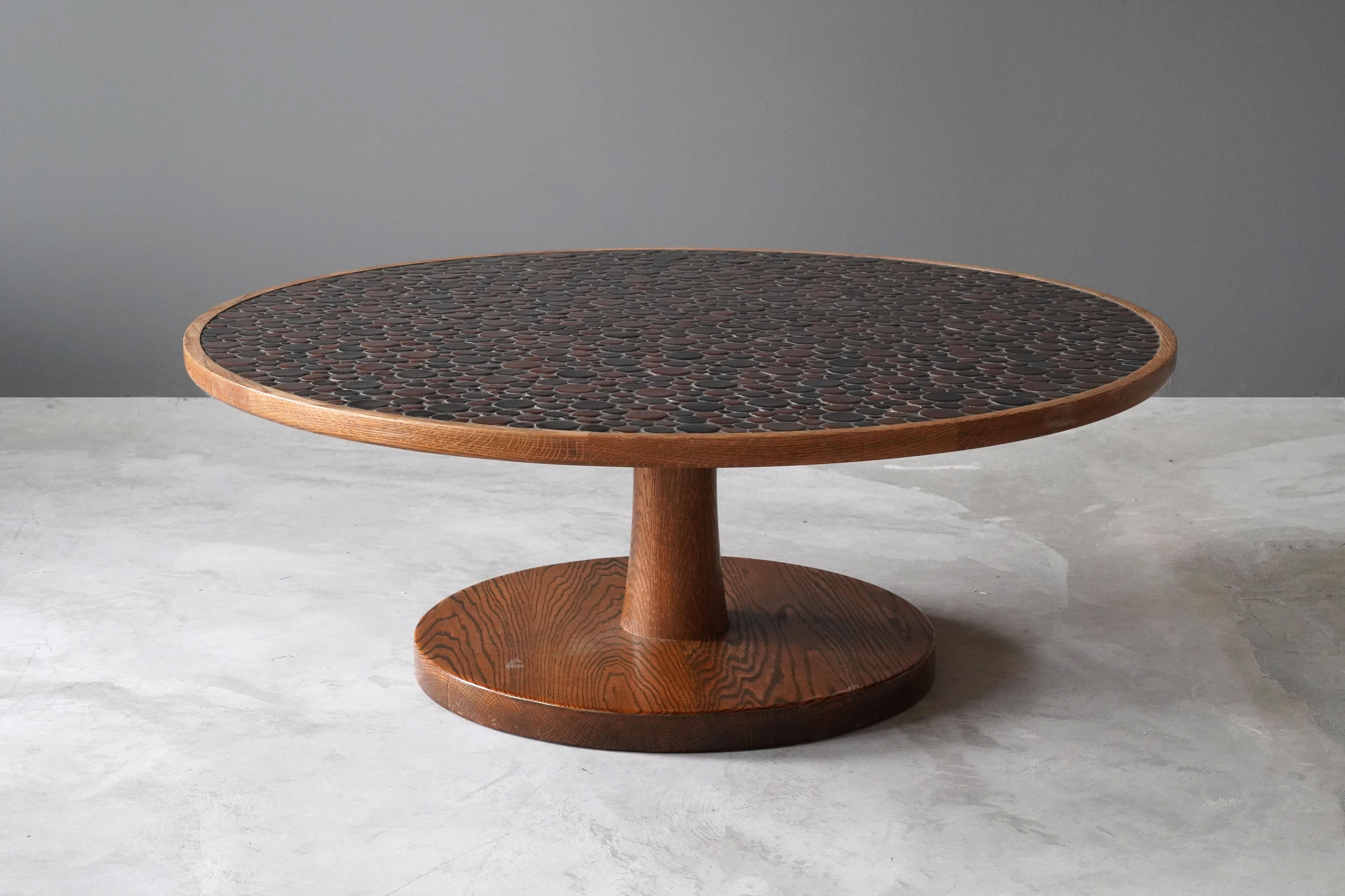 A coffee / cocktail table, designed by husband and wife duo Jane & Gordon Martz. Produced by Marshall Studios, Indianapolis. 

Small ceramic tiles are placed on the top of the oak table.

Jane & Gordon Martz works are represented in the